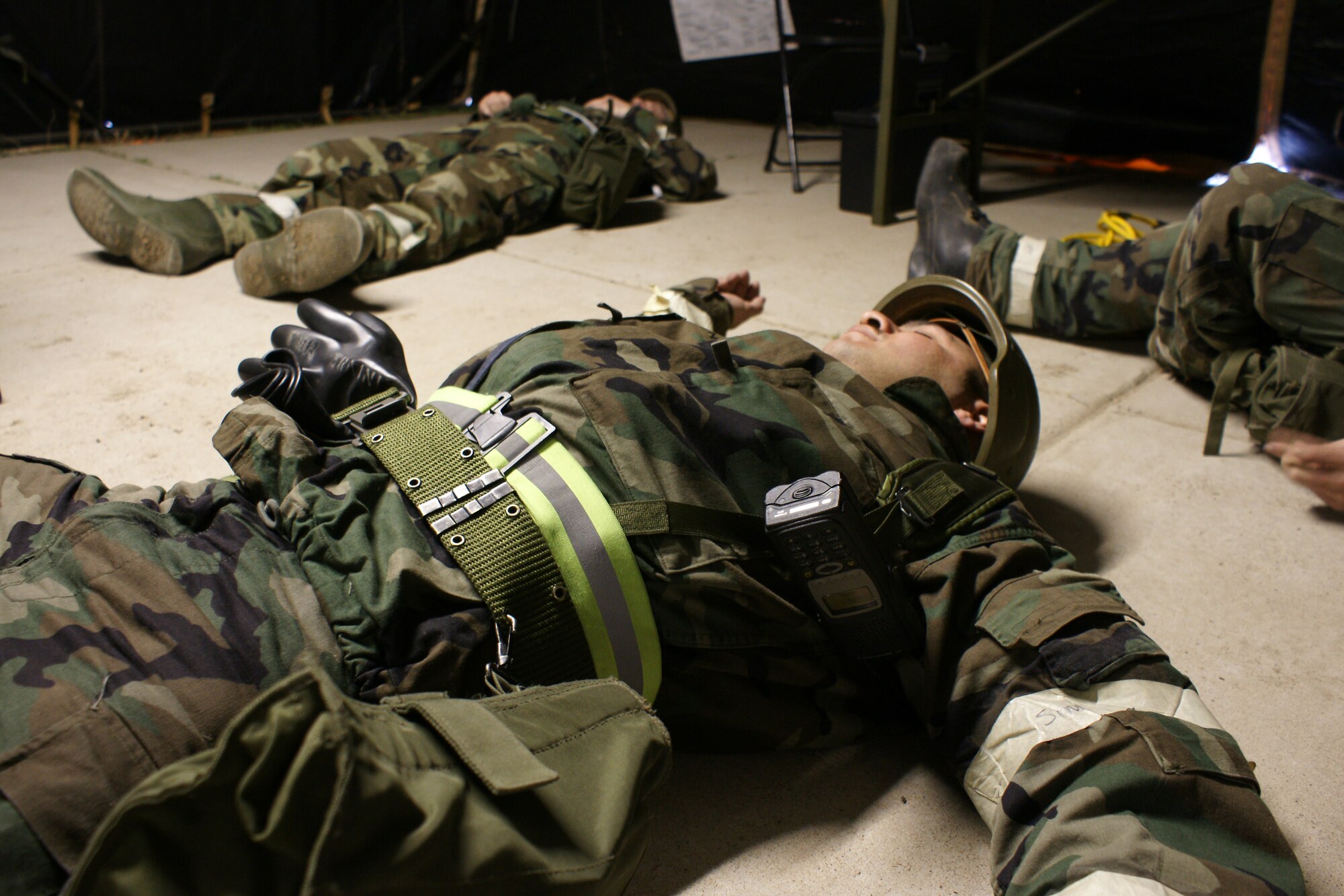 Tech. Sgt. Roberto Moreno and other members of the 419th Communications Squadron play their part as casualties of an improvised explosive device scenario during the final hours of Hill Air Force Base's Operational Readiness Exericse that ended March 26. (U.S. Air Force photo/Staff Sgt. Alan Schultz)