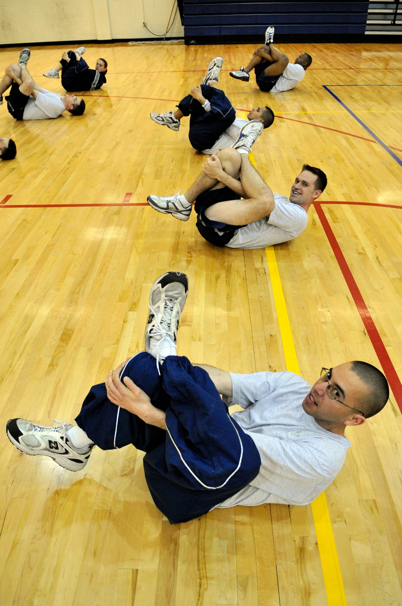 BUCKLEY AIR FORCE BASE, Colo. -- Senior Airman Jose Marinelarena, 460th Operations Support Squadron, stretches during physical training at Buckley Airman Leadership School March 22. ALS trains today's Airmen to become tomorrow's leaders. (U.S. Air Force photo by Senior Airman Kathrine McDowell)