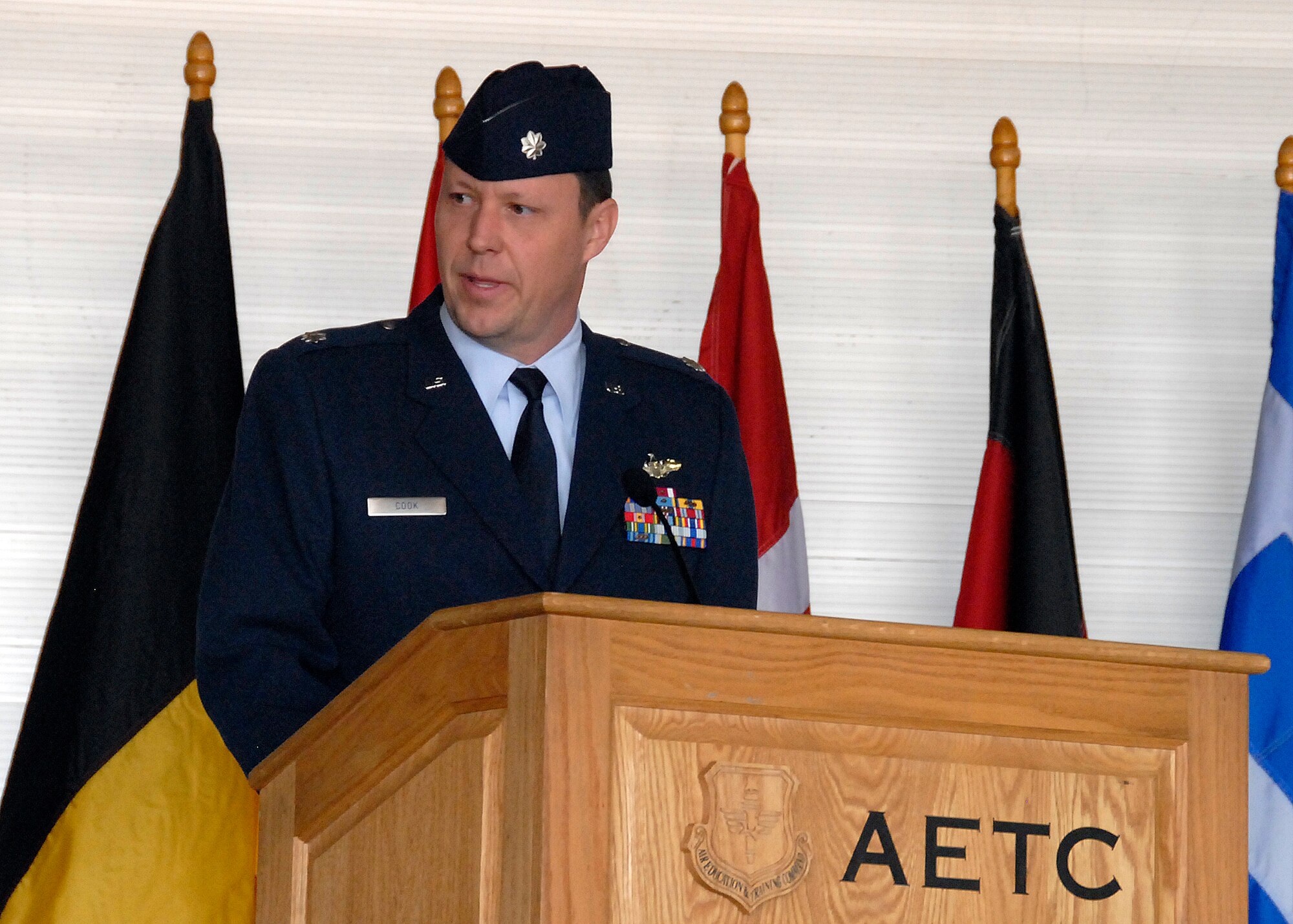 Lt. Col. Barry Cook, new commander of the 80th Operations Support Squadron, speaks to his squadron March 26 during the squadron's change-of-command ceremony at Bldg. 2550 Sheppard Air Force Base, Texas.  Lt. Col. Michael Messer, the outgoing 80th OSS commander, relinquished command. (U.S. Air Force photo/Mike Litteken)