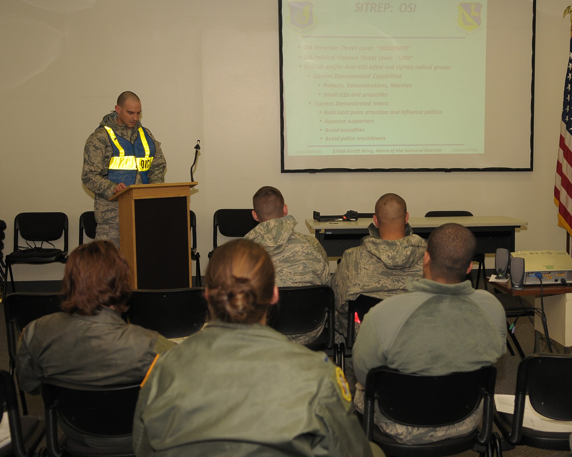 YOKOTA AIR BASE, Japan -- Capt. Michael Weeks, 374th Force Support Squadron manpower and personnel flight commander, briefs inbound personnel Mar. 30 during an operational readiness exercise.  Personnel are sent here from other military installations to help transform Yokota into a transportation hub for the Republic of Korea. (U.S. Air Force photo/Airman 1st Class Sean Martin)