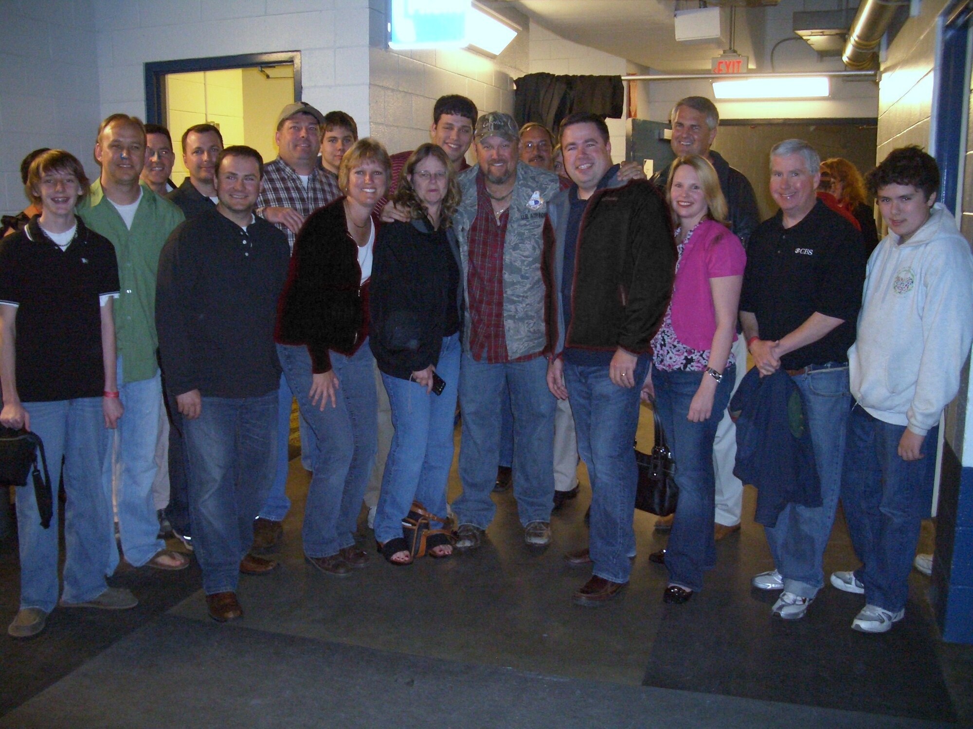 The 315th Public Affairs poses with Larry the Cable Guy backstage before his show.  