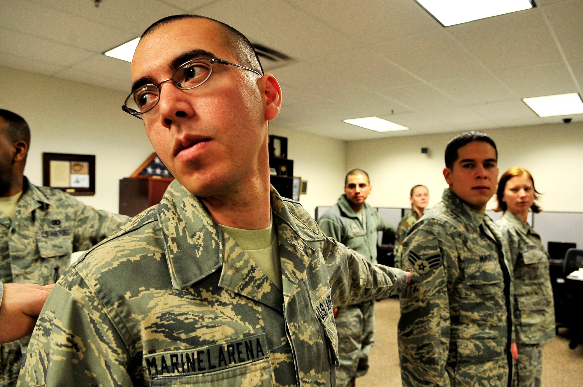 BUCKLEY AIR FORCE BASE, Colo. -- Senior Airman Jose Marinelarena, 460th Operations Support Squadron, practices indoor drill during his first day at Buckley Airmen Leadership School, Feb. 22. ALS trains today's Airmen to become tomorrow's leaders. (U.S. Air Force photo/Senior Airman Kathrine McDowell)