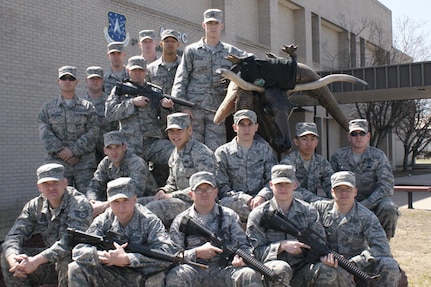 The 3rd Combat Communications Group Guardian Challenge Combat Challenge primary and alternate team members are from bottom row, left to right:  Staff Sgt. David Pattison, Senior Airman Joseph Witkiewicz, Staff Sgt. Adam Benton, Senior Airman David Allen and Airman David Linden. Middle row from left to right:  2nd Lt Kenneth Sturgis, Airmen 1st Class Robert Schuster, Joey Pregont and Nikki Licuanan, and Staff Sgt. Antonio Carrasco. Top row from left to right:  Staff Sgt. Jarod Williams, Senior Airmen Charles Martin and Zachary Skow, Airman 1st Class Benjamin Fleming, Senior Airman Brandon Thompson, A1C Teverence Davis, Capt. Pat Reagan, Buford the Bull. Not pictured:  Staff Sgt. Mathew McCauley (US Air Force photo)
