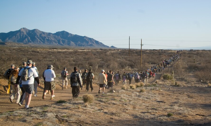 Members of the 103rd Rescue Squadron's Pararescuemen and Chief Rescue Officers take part in the Bataan Memorial Death March on March 21, 2010 at White Sands Missile Range, N.M. The 103rd took part in the two different competitions, the Guard Heavy division and the individual category. Five members took part in the group activity and in order for them to win they all had to cross the finish line within 20 seconds of one another. The 103rd took 1st place in the Guard Heavy division and 7th place in the individual category.   

Photos provided by Bataanmarch.com 
