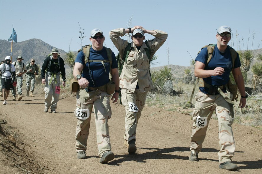 Members of the 103rd Rescue Squadron's Pararescuemen and Chief Rescue Officers take part in the Bataan Memorial Death March on March 21, 2010 at White Sands Missile Range, N.M. The 103rd took part in the two different competitions, the Guard Heavy division and the individual category. Five members took part in the group activity and in order for them to win they all had to cross the finish line within 20 seconds of one another. The 103rd took 1st place in the Guard Heavy division and 7th place in the individual category.   

Photos provided by Brightroom.com
