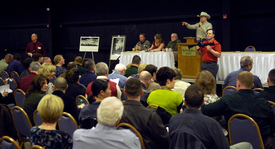 MINOT, N.D. -- John Beardman, auctioneer and Minot area local, auctions off items at the 24th Annual Prairie Warrior Association Auction March 27. The auction allows military members and Minot area locals to come together and support the Team Minot family. (U.S. Air Force photo by Senior Airman Benjamin Stratton)