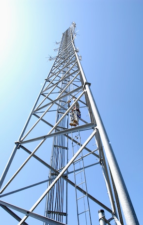 U.S. Air Force Senior Airman Riley Cusson continues his ascent up the radio tower on Joint Base Charleston, S.C., March 23, 2010. The objective of the climb was to maintain climbing certification and to check the line-of-sight to Naval Weapons Station Charleston. Airman Cusson is a radio frequency transmission Systems Specialist with the 628th Communications Squadron. (U.S. Air Force Photo/Airman 1st Class Lauren Main)