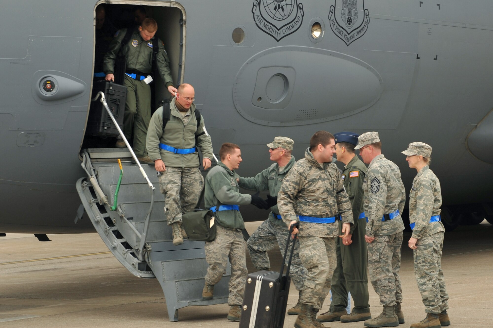SCOTT AIR FORCE BASE, Ill. -- 375th Air Mobility Wing leadership greet wing personnel returning from the Volk Field Combat Readiness and Training Center, Wis. March 27, 2010 as part of an operational readiness inspection. The 375th AMW is being graded by the Air Mobility Command inspector general to ensure they are able to respond to a global threat and deploy combat ready Airmen at a moment's notice. (U.S. Air Force photo by Senior Airman Teresa M. Jennings)