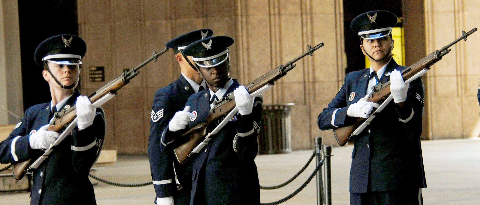 Members of Joint Base Hickam-Pearl Harbor, Hawaii, honor guard perform a rifle volley to honor 28 fallen servicemembers being presented the Hawaii Medal of Honor posthumously during a special ceremony March 23, 2010, in Honolulu, Hawaii. The Hawaii Medal of Honor was created in 2005 to recognize the heroism of those members of the U.S. armed forces with links to Hawaii who are killed in action while serving our country as part of Operation Iraqi Freedom and Operation Enduring Freedom in Iraq and Afghanistan. (U.S. Air Force photo/Tech. Sgt. Jerome S. Tayborn)