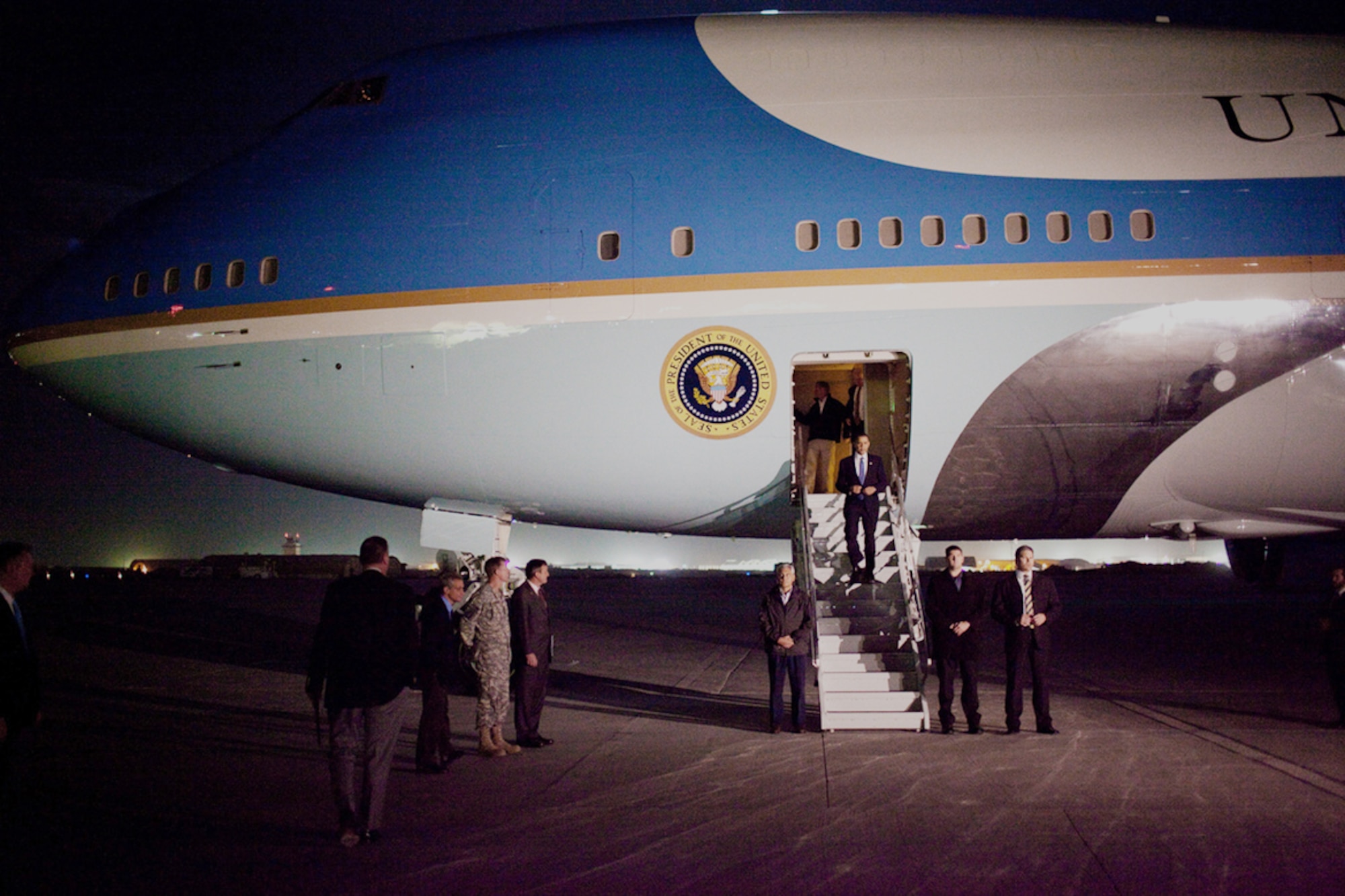 President Barack Obama arrives at Bagram Airfield in Afghanistan March 28, 2010. He was met by U.S. Ambassdor Karl Eikenberry and Army Gen. Stanley McChrystal. (White House photo/Pete Souza)