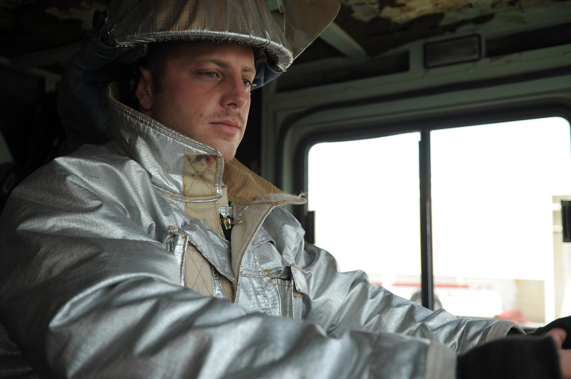Airman 1st Class Kevin Collins, an Air Force firefighter deployed with the 380th Expeditionary Civil Engineer Squadron fire department, drives a fire truck during operations at a non-disclosed base in Southwest Asia on March 29, 2010. As an emergency responder, Airman Collins and his fellow firefighters are responsible for protecting thousands of deployed personnel and billions of dollars of Air Force assets from fire. He is deployed from the 9th Civil Engineer Squadron at Beale Air Force Base, Calif., and his hometown is Gilroy, Calif. (U.S. Air Force Photo/Master Sgt. Scott T. Sturkol/Released)