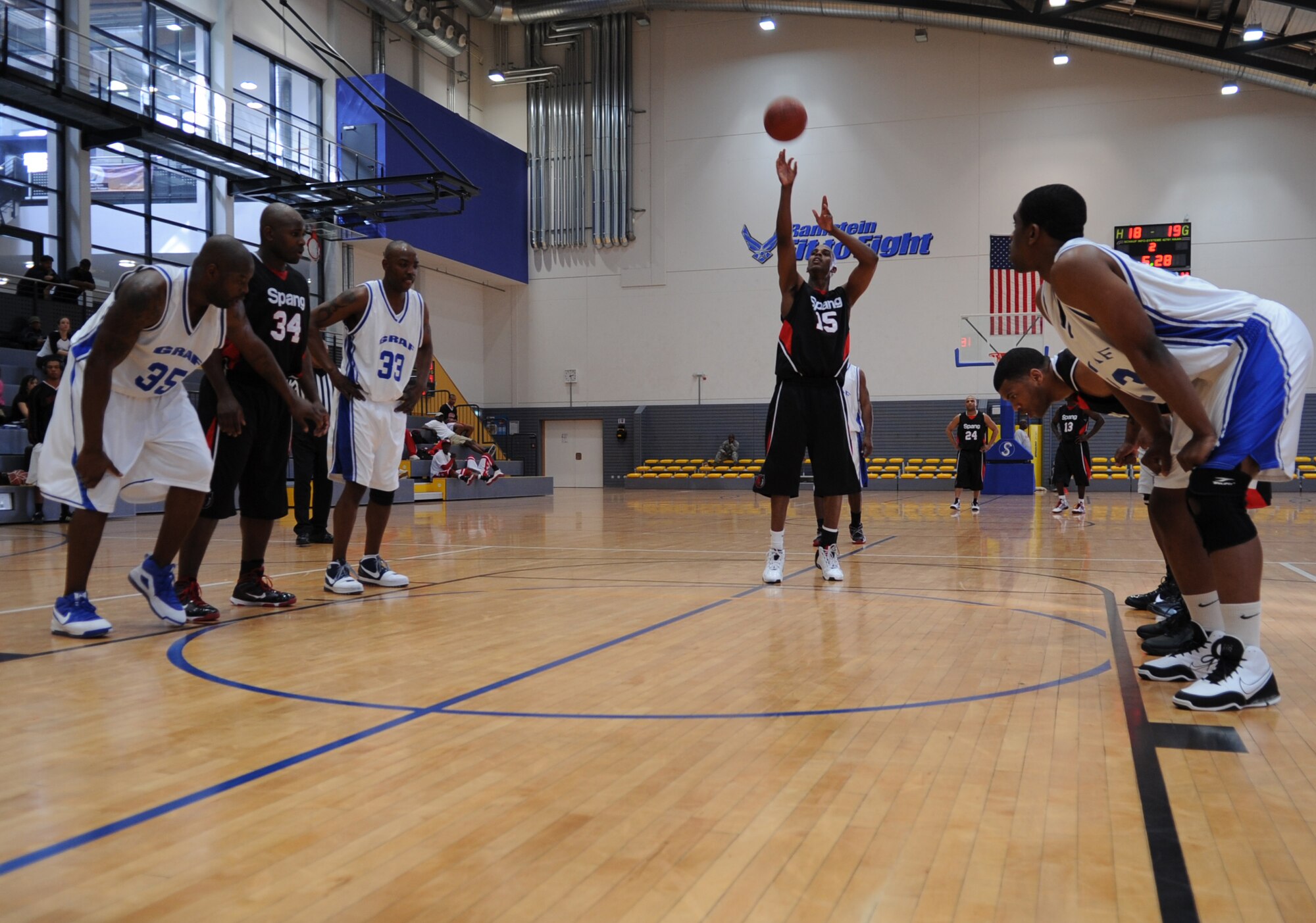 U.S. Air Force Senior Airman Davon Martin, Spangdahlem Sabers, shoots a free throw during a U.S. Forces Europe basketball game, Ramstein Air Base, Germany, March 24, 2010. The 86th Services Squadron hosted the U.S. Armed Forces Europe Men's and Women's basketball championship series, a tournament consisting of U.S. servicemembers, dependents and retirees from around the European Theater. (U.S. Air Force photo by Airman 1st Class Caleb Pierce)