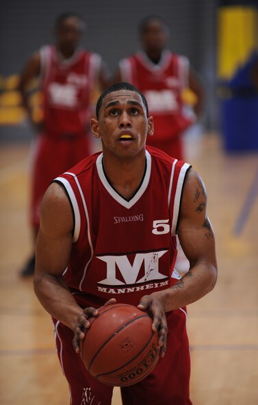 U.S. Army Private 2nd Class Thomas Wright, Mannheim Mustangs, shoots a free throw during a U.S. Forces Europe Basketball Championships, Ramstein Air Base, Germany, March 24, 2010. The 86th Services Squadron hosted the U.S. Armed Forces Europe Men's and Women's basketball championship series, a tournament consisting of U.S. servicemembers, dependents and retirees from around the European Theater. (U.S. Air Force photo by Airman 1st Class Caleb Pierce)