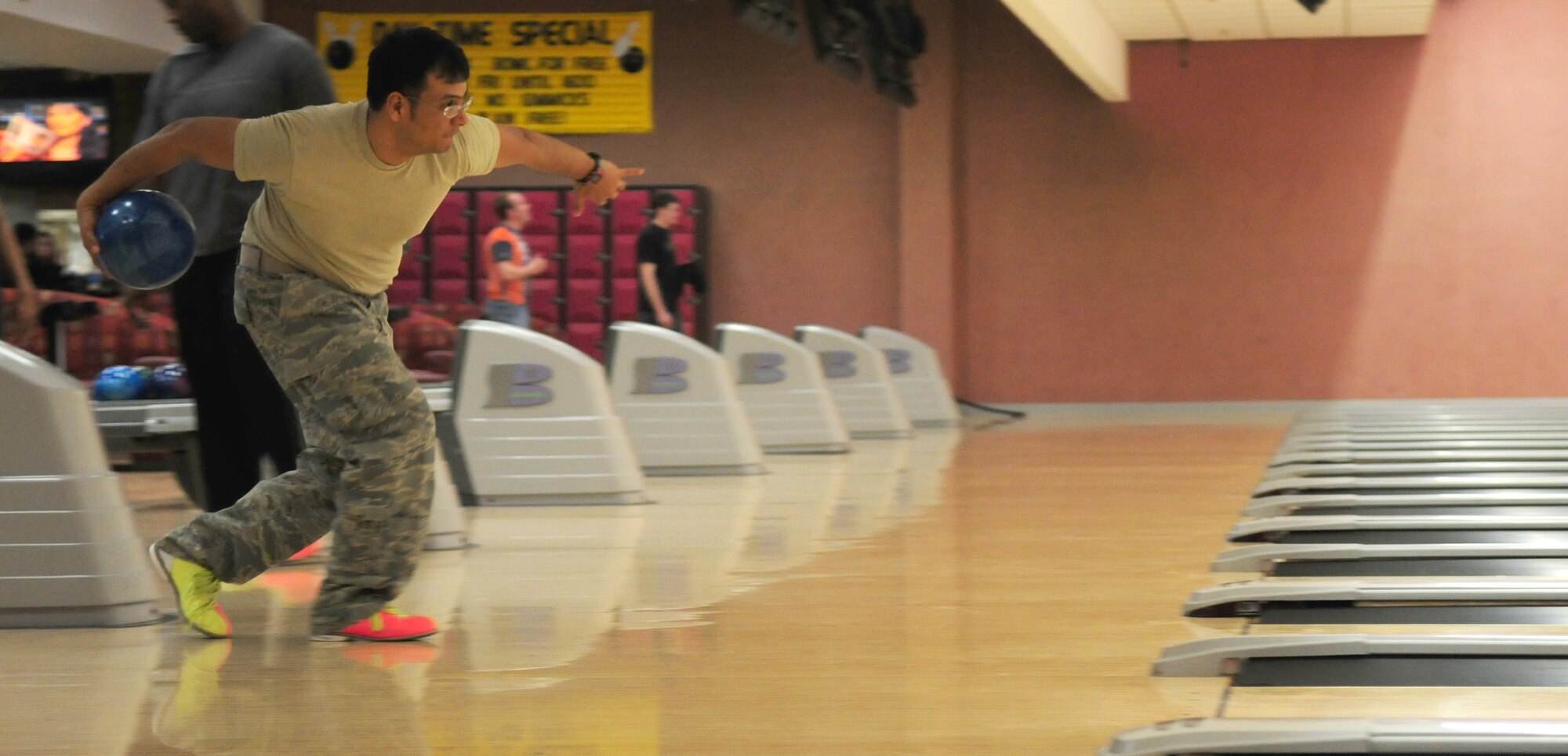 SPANGDAHLEM AIR BASE, Germany -- Master Sgt. Edward Conde, 606th Air Control Squadron assistant NCO in charge radar maintenance, bowls at Eifel Lanes Bowling Center March 25 to support a Sexual Assault Awareness Month fundraiser.  A variety of events held March 15 - April 16 will engage community members to get involved while providing education about sexual assault and prevention. (U.S. Air Force photo/Staff Sgt. Heather M. Norris)
