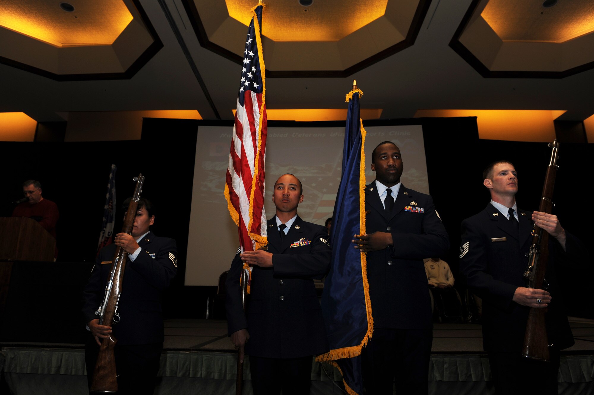 Airmen from Luke Air Force Base, Ariz., post the colors during the opening ceremony March 28, 2010, for the 24th National Disabled American Veterans Winter Sports Clinic in Snowmass Village, Colo. The event is sponsored by the Department of Veterans Affairs and Disabled American Veterans. (U.S. Air Force photo/Staff Sgt. Desiree N. Palacios)