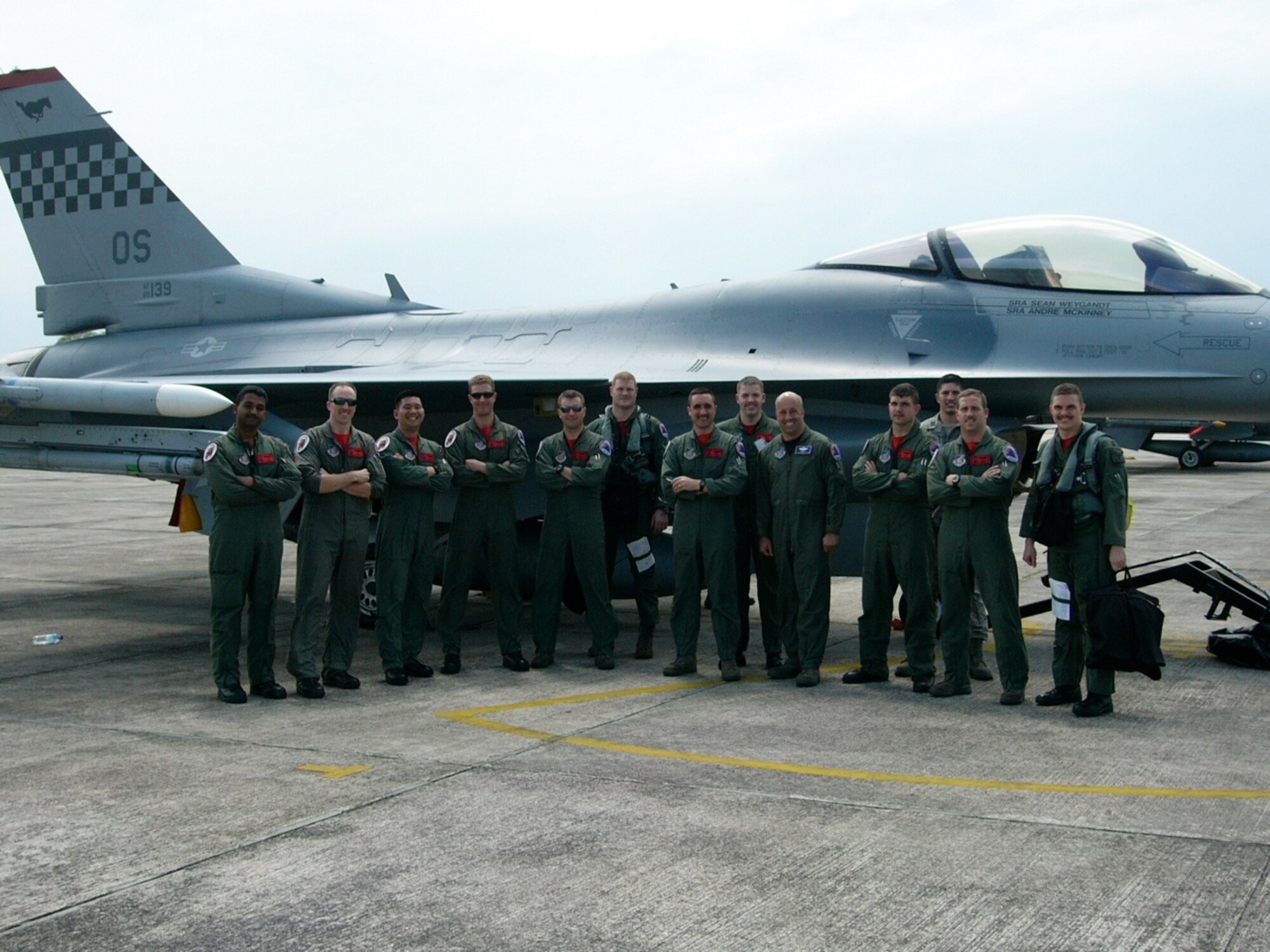 Airmen from Osan Air Base, Republic of Korea, gather for a group photo during exercise Commando Sling 10 at Paya Lebar AB, Singapore. (Courtesy photo)