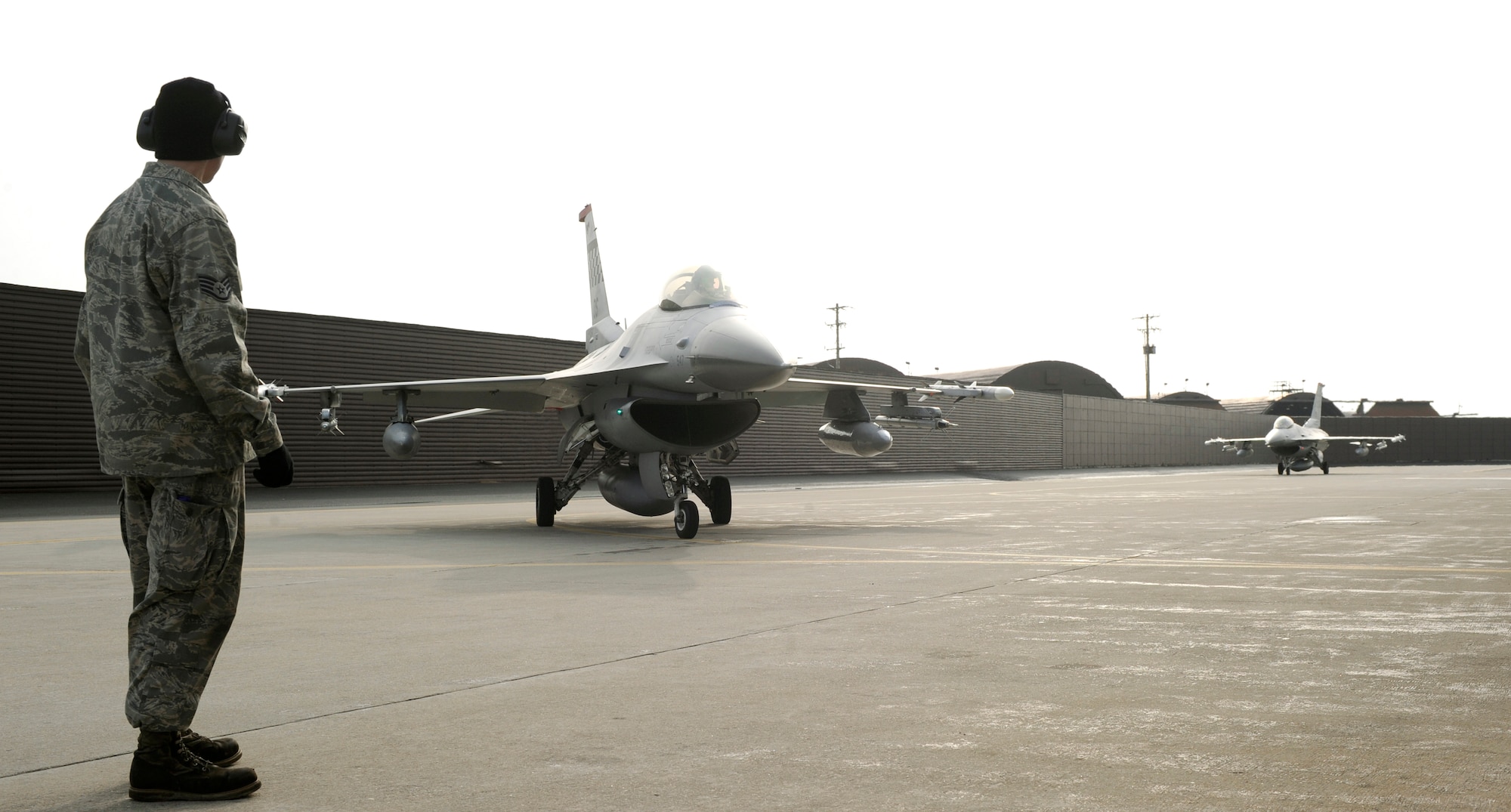 F-16 Fighting Falcon aircraft return to Osan Air Base, Republic of Korea, March 15 after participating in exercise Commando Sling 10 at Paya Lebar AB, Singapore. (U.S. Air Force photo/Senior Airman Stephenie Wade)
