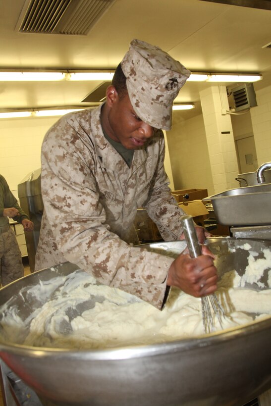 Food service Marines prepare evening chow at a Fort Pickett mess hall during 26th Marine Expeditionary Unit’s first pre-deployment training exercise aboard Fort Pickett, Va., March 30, 2010. The exercise is the first in a series of training evolutions for the MEU that will culminate in its deployment aboard the ships of the Kearsarge Amphibious Ready Group in the fall. (Official United States Marine Corps Photo by Lance Cpl. Santiago G. Colon Jr.) (Released)::r::::n::::r::::n::