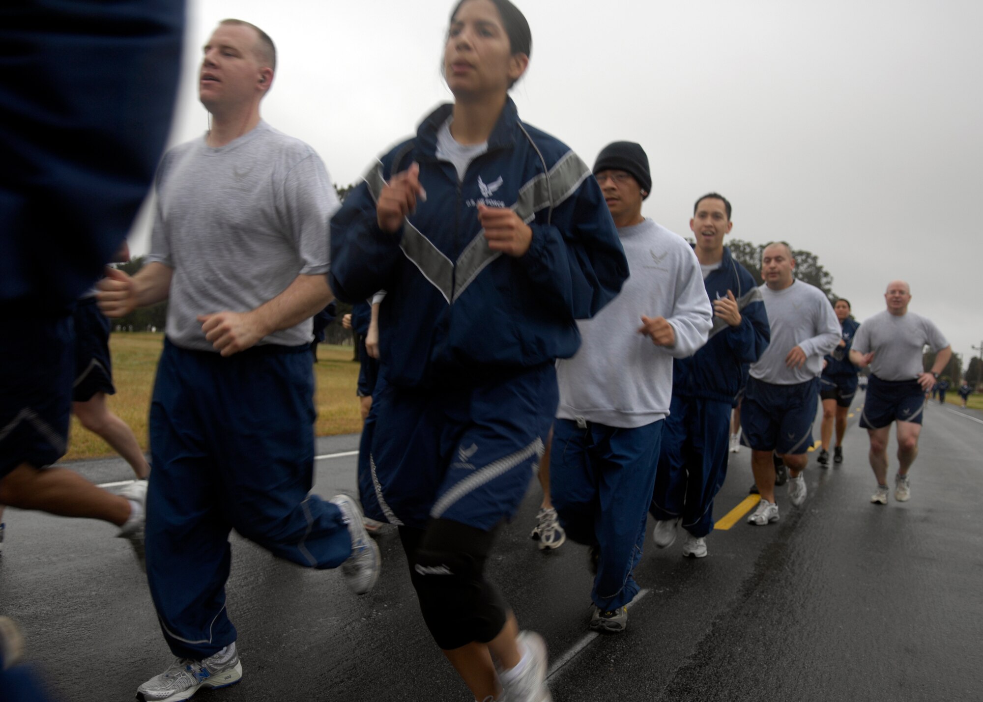 VANDENBERG AIR FORCE BASE, Calif. -- Members of the 30th Logistics Readiness Squadron ran in formation in the April Awareness Month Kick-off Run here Tuesday, March 30, 2010. The run was not only meant to raise awareness of social ills, but also to maintain 30th Space Wing fitness standards. (U.S. Air Force photo/Airman 1st Class Lael Huss)  
