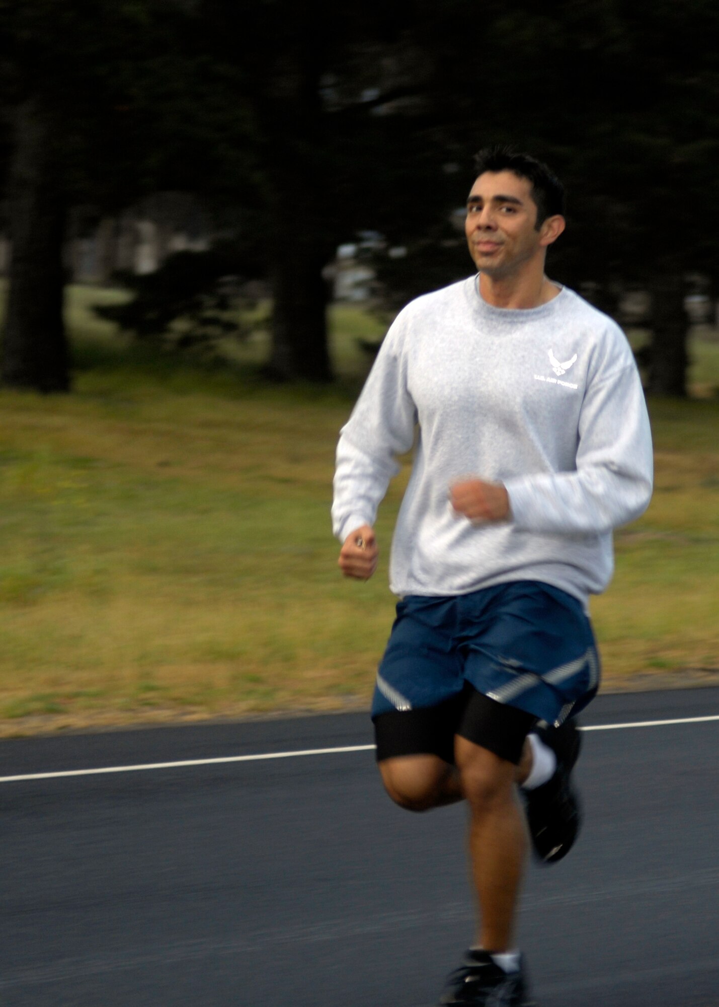 VANDENBERG AIR FORCE BASE, Calif. -- In the lead, Staff Sgt. Anthony Cardenas, of the 381st Training Squadron, takes part in the April Awareness Month Kick-off Run here Tuesday, March 30, 2010. The Airmen followed a route along Nebraska Avenue, Ocean View Boulevard, Washington Avenue and Utah Avenue, which is a cumulative three miles. (U.S. Air Force photo/Airman 1st Class Lael Huss) 
