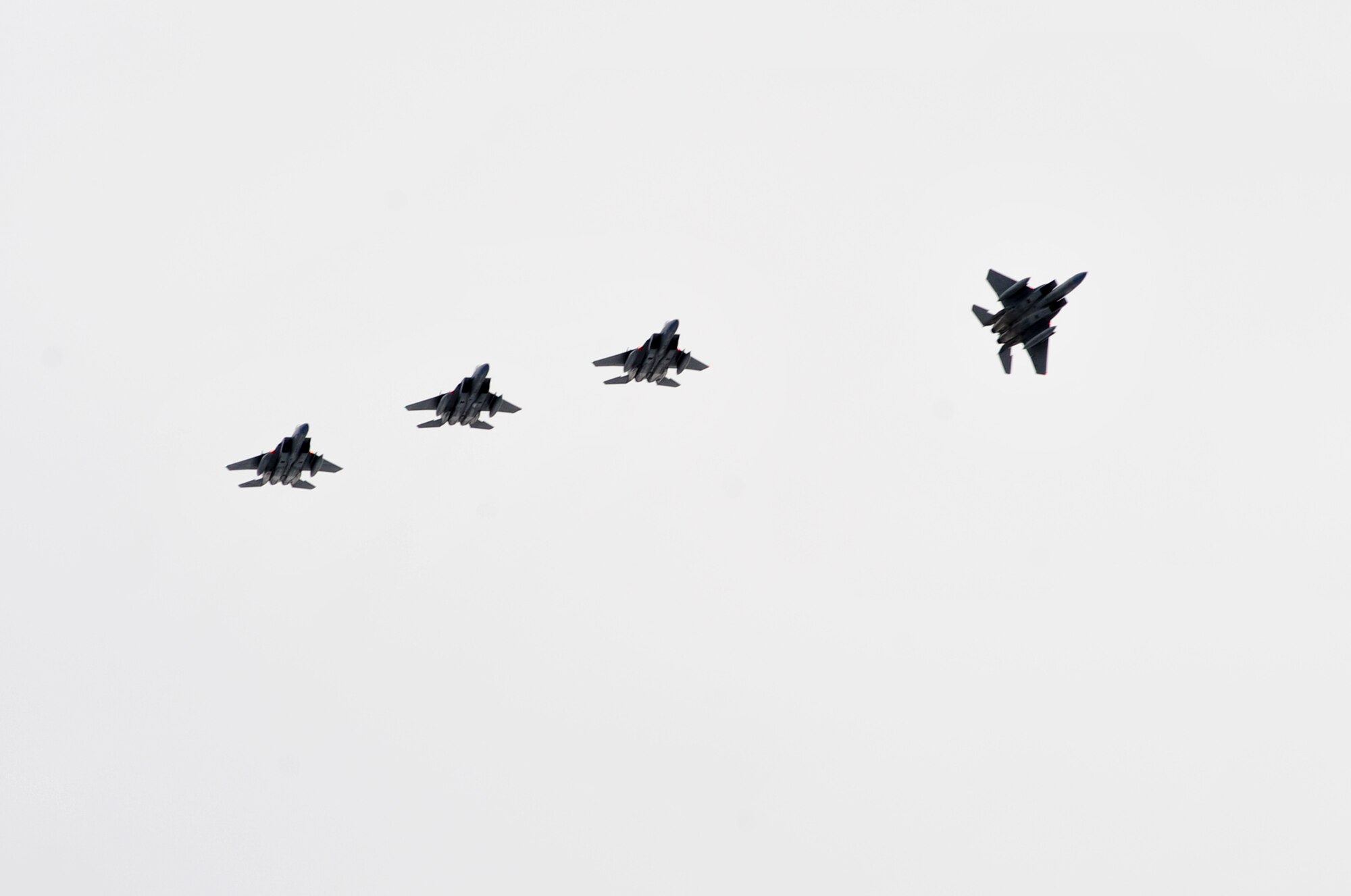 ELMENDORF AIR FORCE BASE, Alaska – A F-15 Eagle peels off of a four-jet formation as it prepares to land March 29. Elmendorf’s 19th Fighter Squadron will soon be decommissioned with the first F-15s leaving in April 2010 and the final few scheduled to leave in September 2010. Some of the jets returned from more than a month-long temporary duty assignment. Four jets from the 19th Fighter Squadron participated in Thailand’s exercise Cope Tiger from Feb. 26-March 13. After departing Thailand, they flew to Kadena Air Base where they rested for two days and flew out March 15 to meet up with four other Elmendorf F-15s, that participated in Cope Thaw in Hawaii. (Air Force photo by Airman 1st Class Christopher Gross)