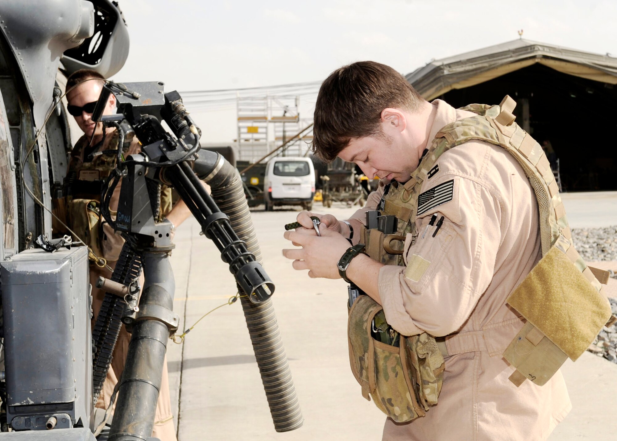 Capt. Rob Roth gears up during a preflight check March 5, 2010, at Kandahar Airfield, Afghanistan. Captain Roth is assigned to the 66th Expeditionary Rescue Squadron mission pilot from Nellis Air Force Base, Nev. (U.S. Air Force photo/Senior Airman Nancy Hooks)