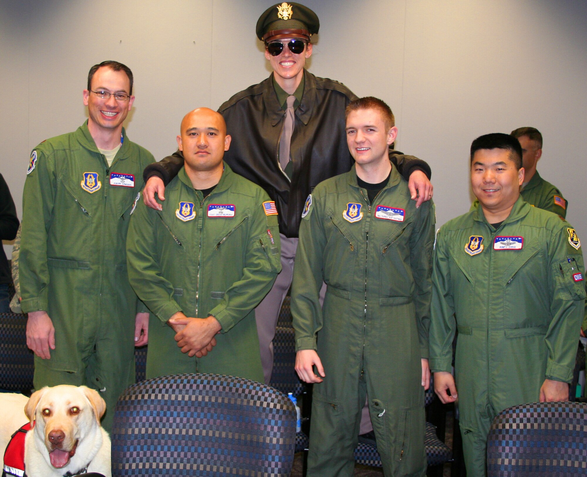 The 6th Space Operation Squadron Guardian Challenge team from left, Maj. Jeremy Edwards, Tech. Sgt. Uriah Nomura, Senior Airman Thomas Hastings, and Maj. Minpo Shiue pose with the 6SOPS Bombardier mascot, Maj. Judy Kelley (back row) and the canine mascot Nugget prior to competing in Guardian Challenge. (U.S. Air Force photo by Capt. Maren P. Barney)