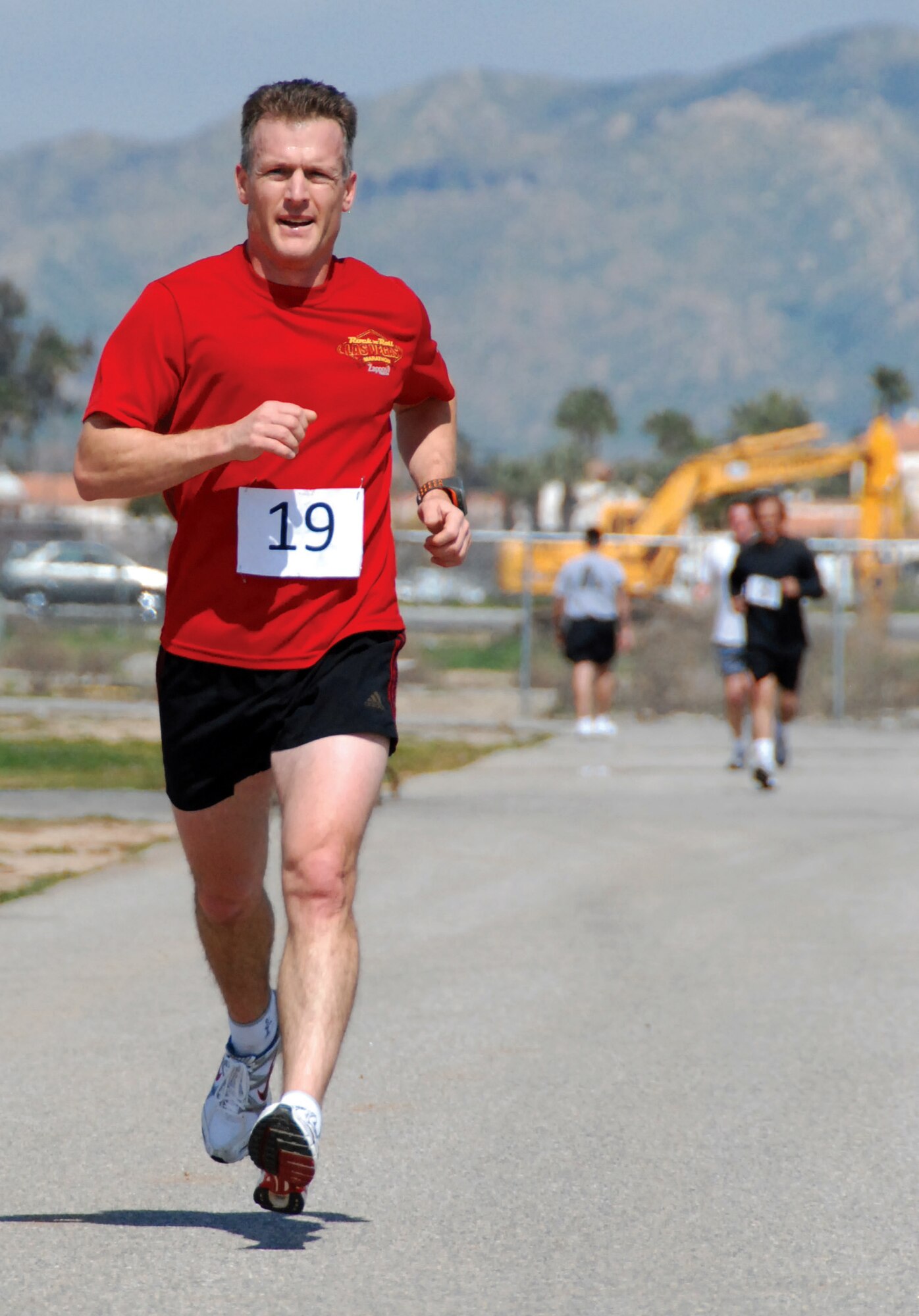 10K WINNER: Lt. Col. Kris Kraiger paces himself at the 5K/10K Run/Walk for Wounded Warriors event at March ARB, Mar. 11. Colonel Kraiger took first place in the 10K race and also had the fastest time for the 5K course. His time for the 5K was 19:40, and the 10K was 39:57. He raised $130 for wounded warriors. Master Sgt. Cynthia Sartin finished first in the women’s 5K with a time of 25:42. (U.S. Air Force photo by Henry Kim)