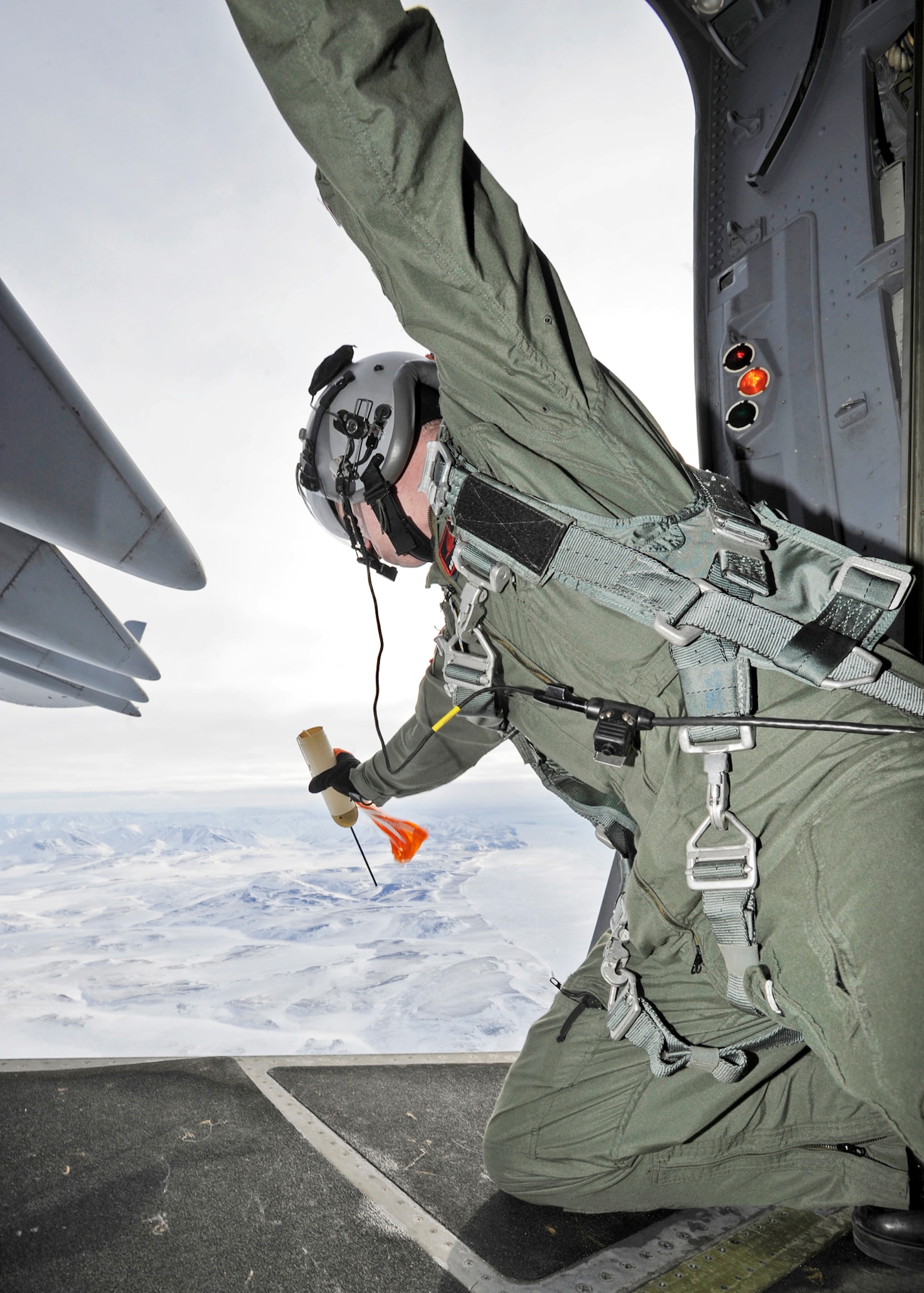 Staff Sgt. Chris McKnight prepares to deploy a sonde transmitter March 19, 2010, at Elmendorf Air Force Base, Alaska. Sergeant McKnight and his crew from the 517th Airlift Squadron participated in a combat simulation improved container delivery drop over Tin City, Alaska. (U.S. Air Force photo/Senior Airman Matt Coleman-Foster)