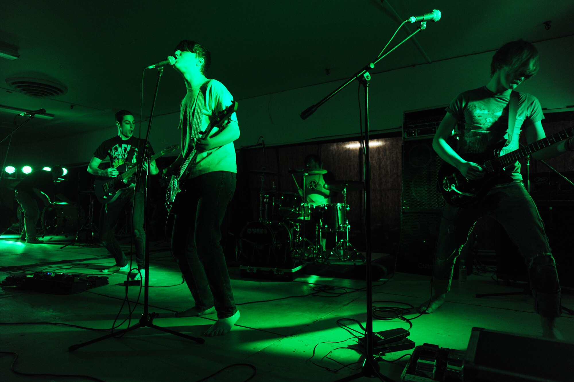 MINOT AIR FORCE BASE, N.D. -- I, Apparatus play a song at Minot Air Force Base during the Battle of the Bands competition held at the old base shopette March 26. Six bands showcased their talent and let the audience decide the winner. The first-ever event was sponsored by the 5th Force Support Squadron. (U.S. Air Force photo by Staff Sgt. Stacy Moless)