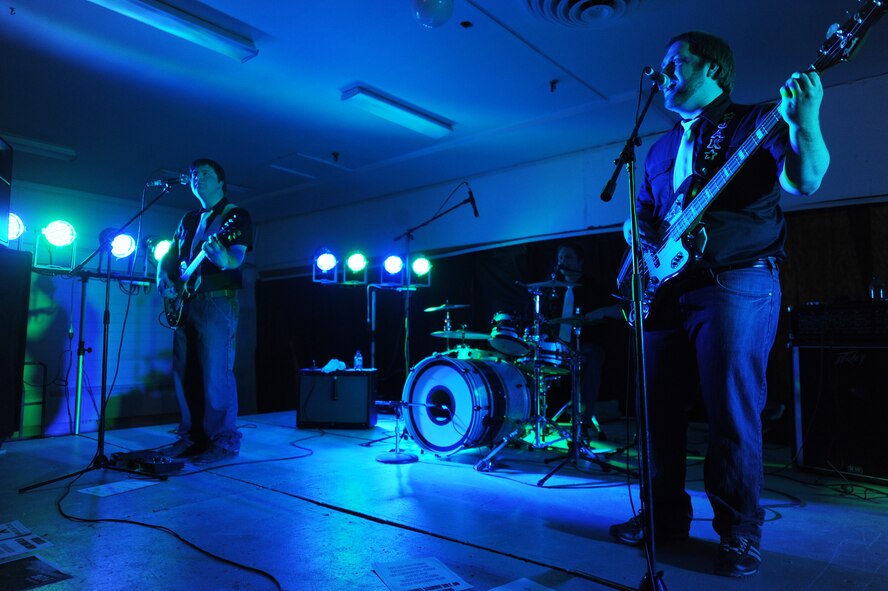 MINOT AIR FORCE BASE, N.D. -- The Gregorian Punks rock Minot Air Force Base during the Battle of the Bands competition held at the old base shopette March 26. Six bands showcased their talent and let the audience decide the winner. The first-ever event was sponsored by the 5th Force Support Squadron. (U.S. Air Force photo by Staff Sgt. Stacy Moless)