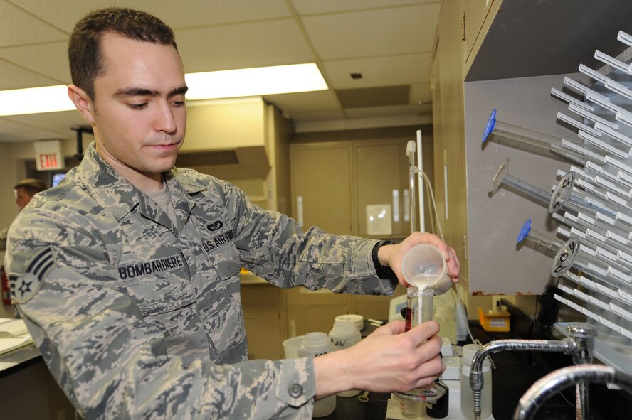 WHITEMAN AIR FORCE BASE, Mo. -Senior Airman Ryan Bombardiere, 509th Civil Engineer Squadron water treatment plant operator, prepares to weigh the bi-product, which is the sediment from the water, for testing purposes here, March 29 2010. The water treatment plant here goes beyond what Missouri Department of Natural Resources requires, ensuring the highest quality water for Team Whiteman. (U.S. Air Force photo/Airman 1st Class Carlin Leslie)  (Released)