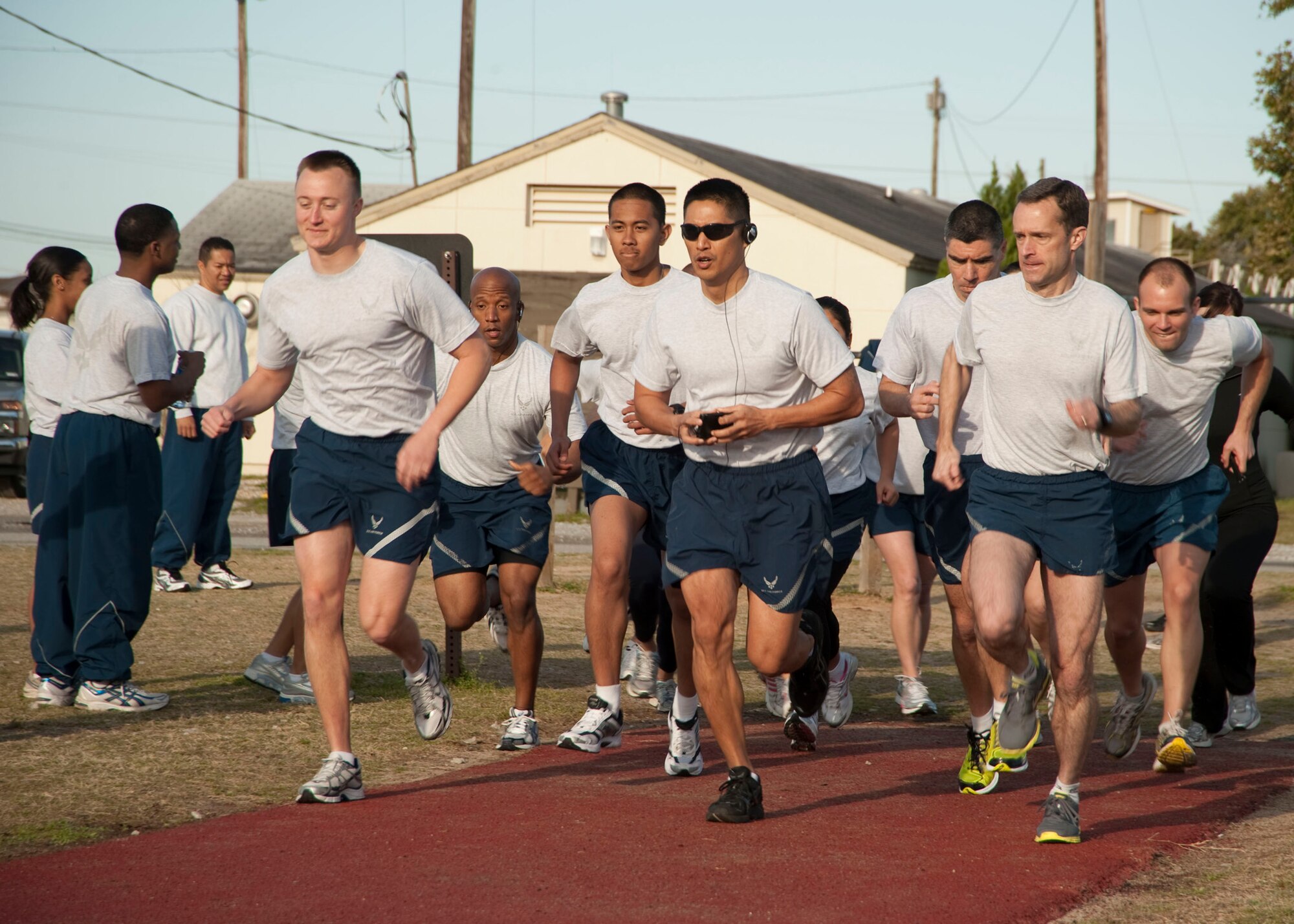 Airmen begin the 5K run portion of the physical fitness event March 26 at Eglin Air Force Base, Fla.  The event included push-ups and sit-ups as well.  (Courtesy photo.)