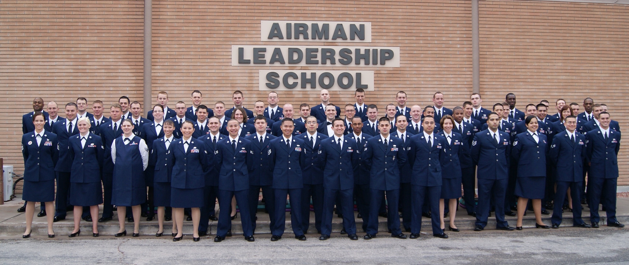 Airman Leadership School class 10-C pose for a picture in front of the ALS. The following Airmen graduated Airman Leadership School from the officers club March 25. There were five distinguished graduates, one John Levitow Award winner, one academic award winner and one leadership award winner.
