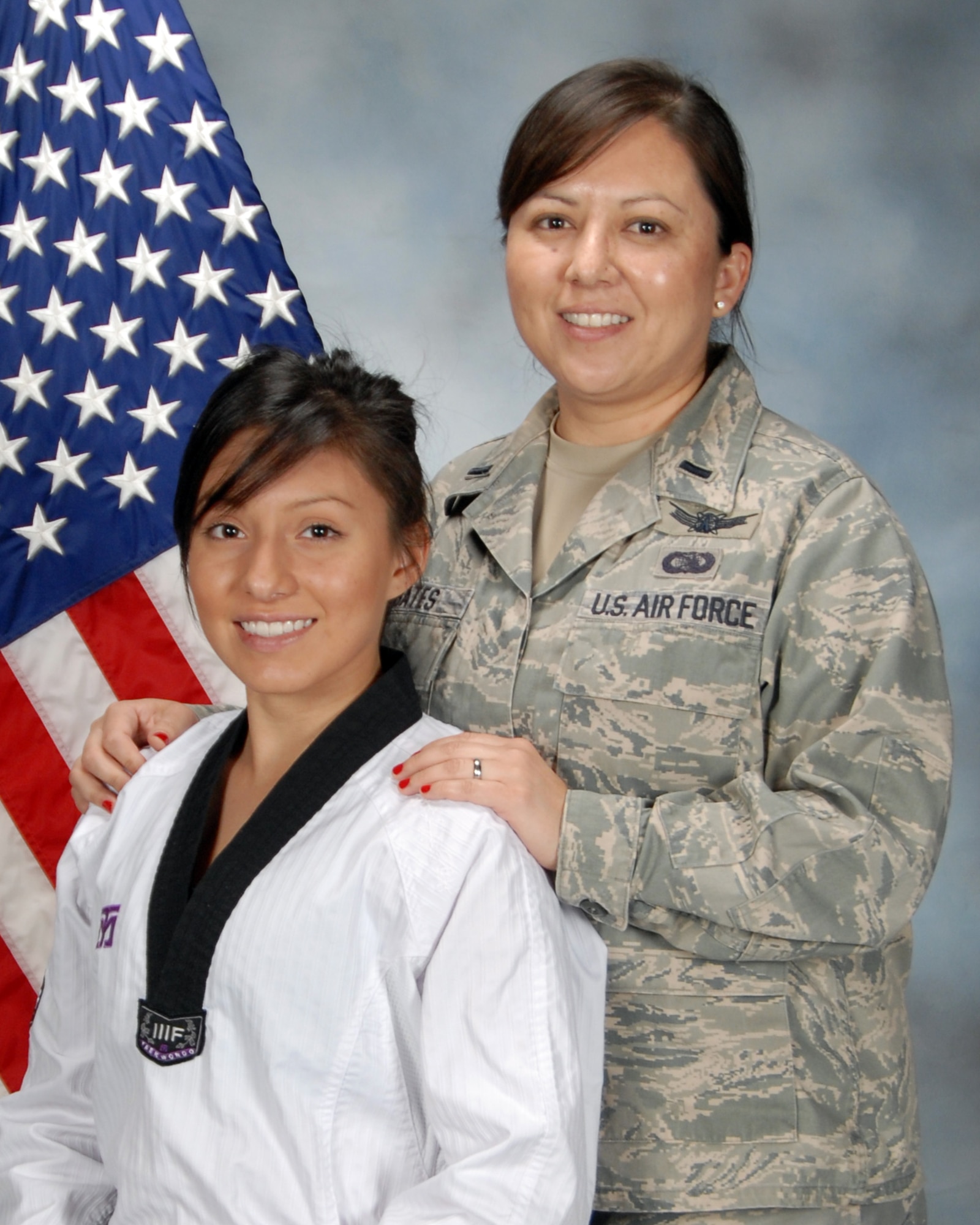 Pictured are Jessie Bates and her mother, Lt. Lynette Bates, Space Based Infrared Systems Wing. Jessie is one of three Americas who qualified to represent the U.S at the Youth Olympics in Taekwondo.  The games will be held in August in Singapore.(Photo by Jim Gordon)