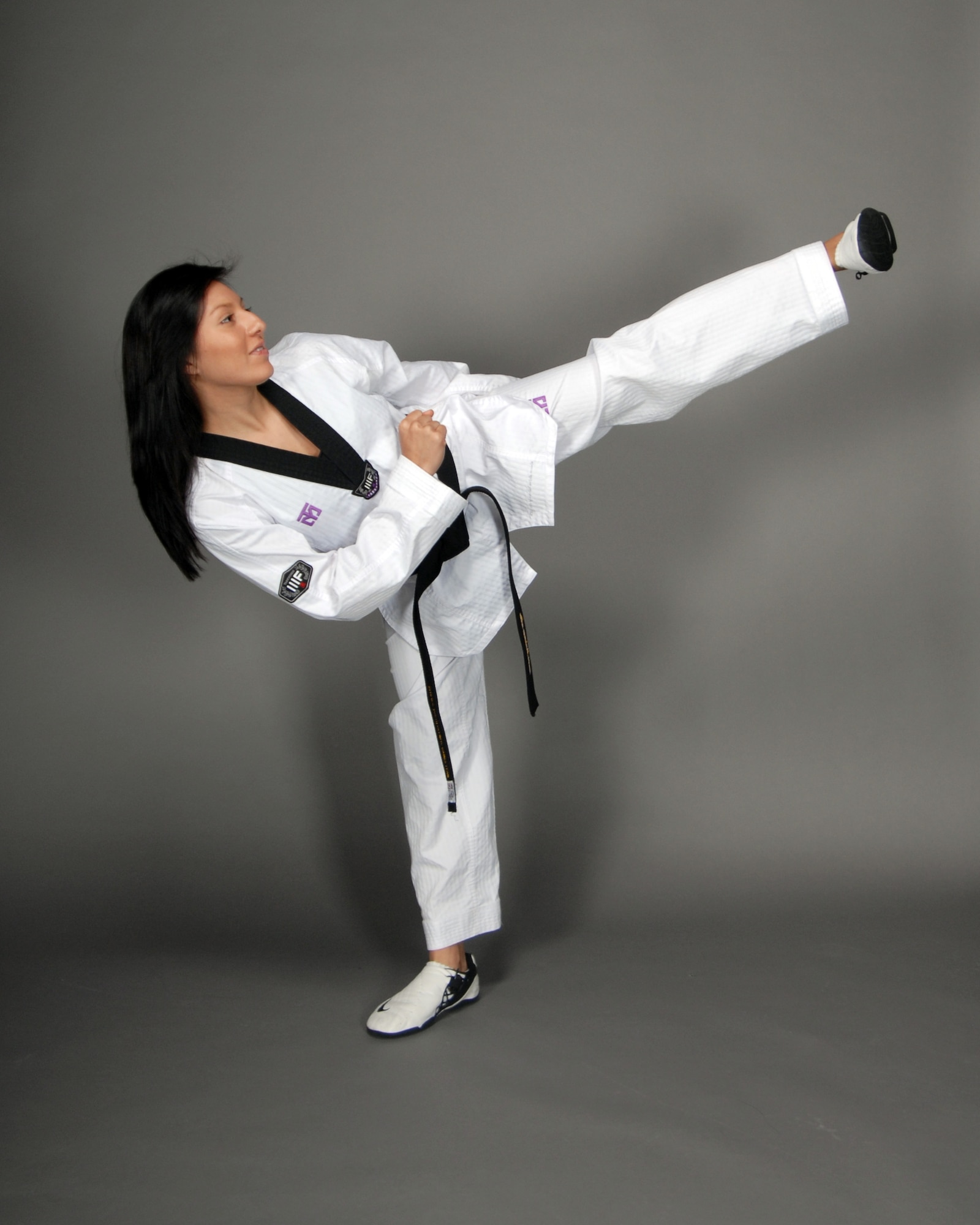 Family Member Jessie Bates demonstrates her Taekwondo skills. The 16-year old has been selected to represent the U.S. in Singapore at the Youth Olympics. The games will be held in August. (Photo by Jim Gordon)