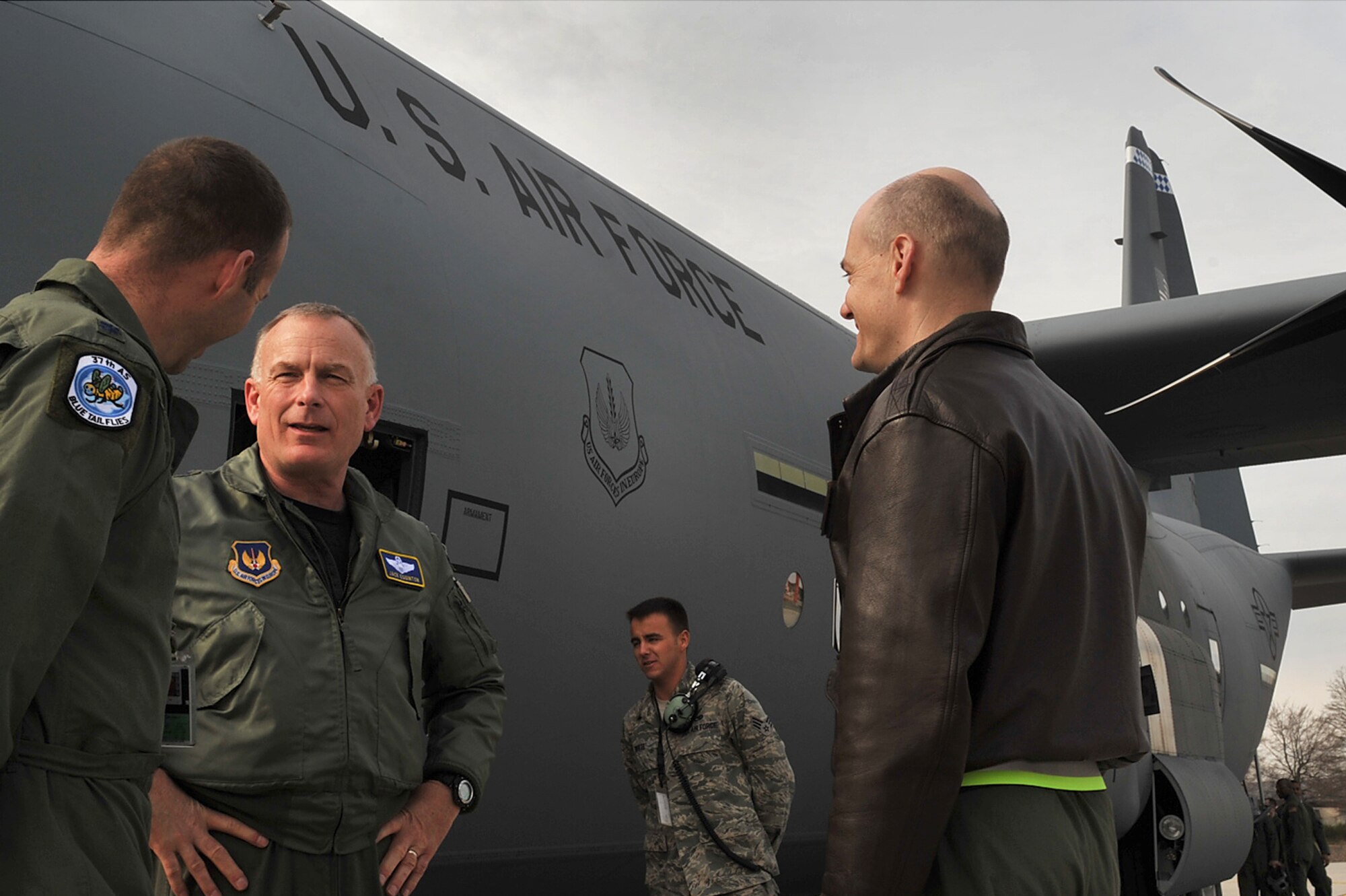 Maj. Gen. Jack Egginton, Director, Air and Space Operations, Headquarters U.S. Air Forces in Europe, talks with Lt.Col. Matt Wehner (left), Director of Operations, 37th Airlift Squadron, and Col. Tim Budd (right), Commander, 86th Operations Group, beside Ramstein's newly delivered 13th C-130J Super Hercules, Ramstein Air Base, Germany, March 30, 2010. Fourteen C-130J models will be assigned to Ramstein, replacing the older C-130Es as a part of the Air Force’s priority to revitalize the aircraft fleet. (U.S. Air Force photo by Senior Airman Tony R. Ritter)