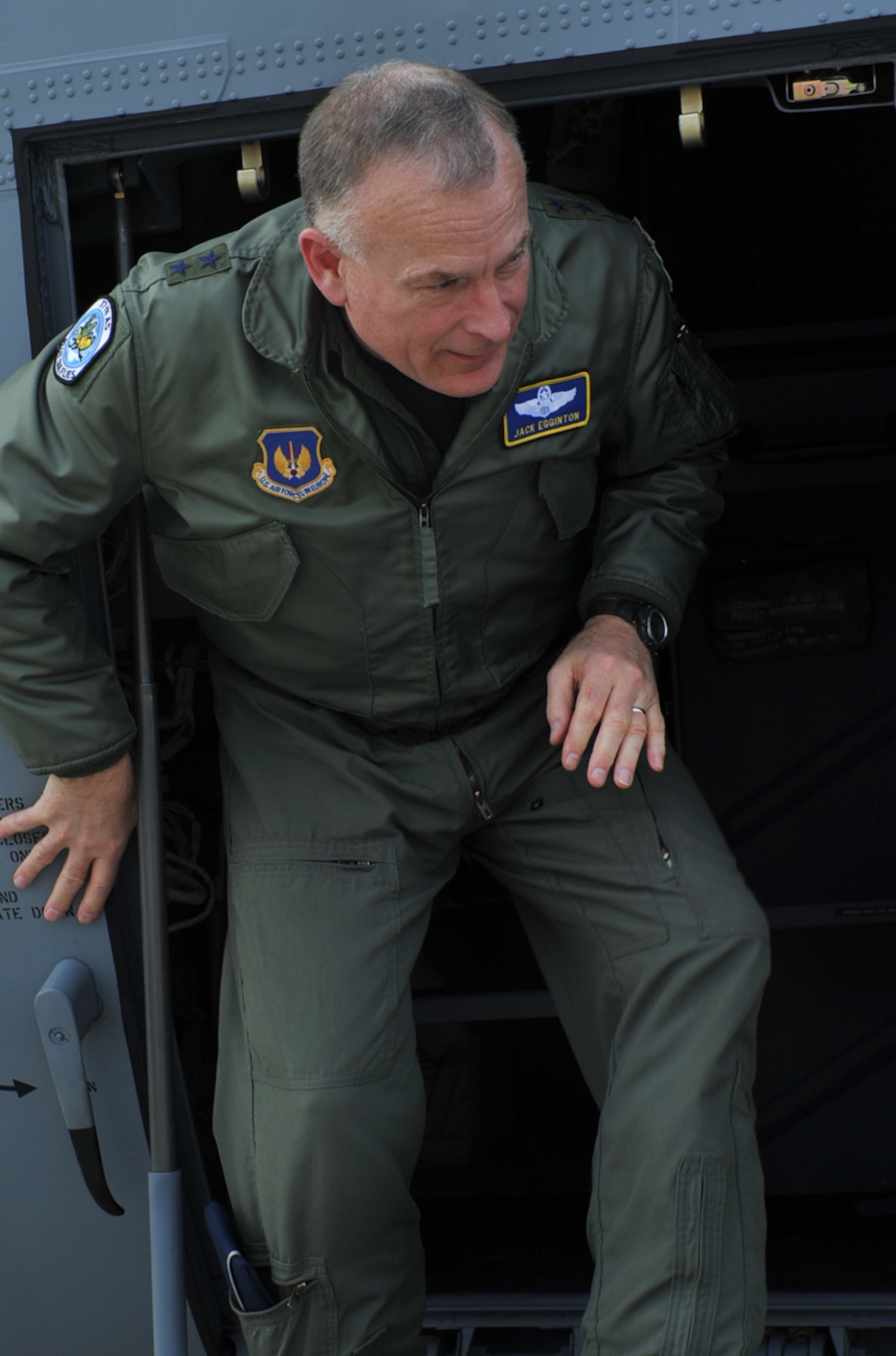 Maj. Gen. Jack Egginton, Director, Air and Space Operations, Headquarters U.S. Air Forces in Europe steps off Ramstein's 13th C-130J Super Hercules after piloting it in, Ramstein Air Base, Germany, March 30, 2010. Fourteen C-130J models will be assigned to Ramstein, replacing the older C-130Es as a part of the Air Force’s priority to revitalize the aircraft fleet. (U.S. Air Force photo by Senior Airman Tony R. Ritter)
