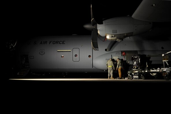 U.S. Air Force Airman 1st Class Craig Mason and Staff Sgt. Curtis Gempler, 86th Aircraft Maintenance Squadron aerospace propulsion maintainers, repair an auxiliary power unit on a C-130J Super Hercules, Ramstein Air Base, Germany, March 30, 2010. Ramstein currently has 11 C-130J models and expect two more in the next few months. (U.S. Air Force photo by Airman 1st Class Grovert Fuentes-Contreras)