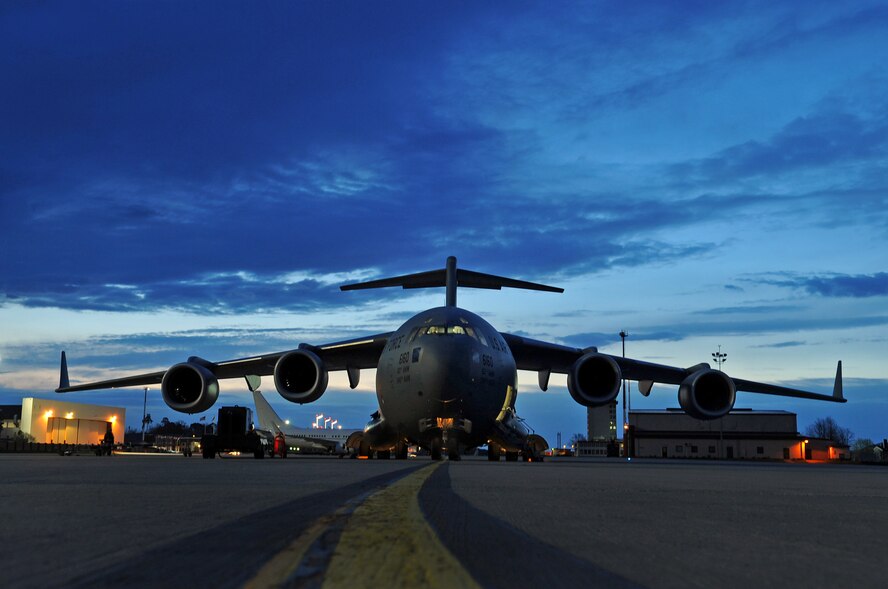 A U.S. Air Force C-17 Globemaster III prepares to be inspected for take-off, Ramstein Air Base, Germany, March 30, 2010. The C-17 is used for rapid strategic airlift of troops and cargo to main operating bases or forward operating bases throughout the world. (U.S. Air Force photo by Airman 1st Class Grovert Fuentes-Contreras)