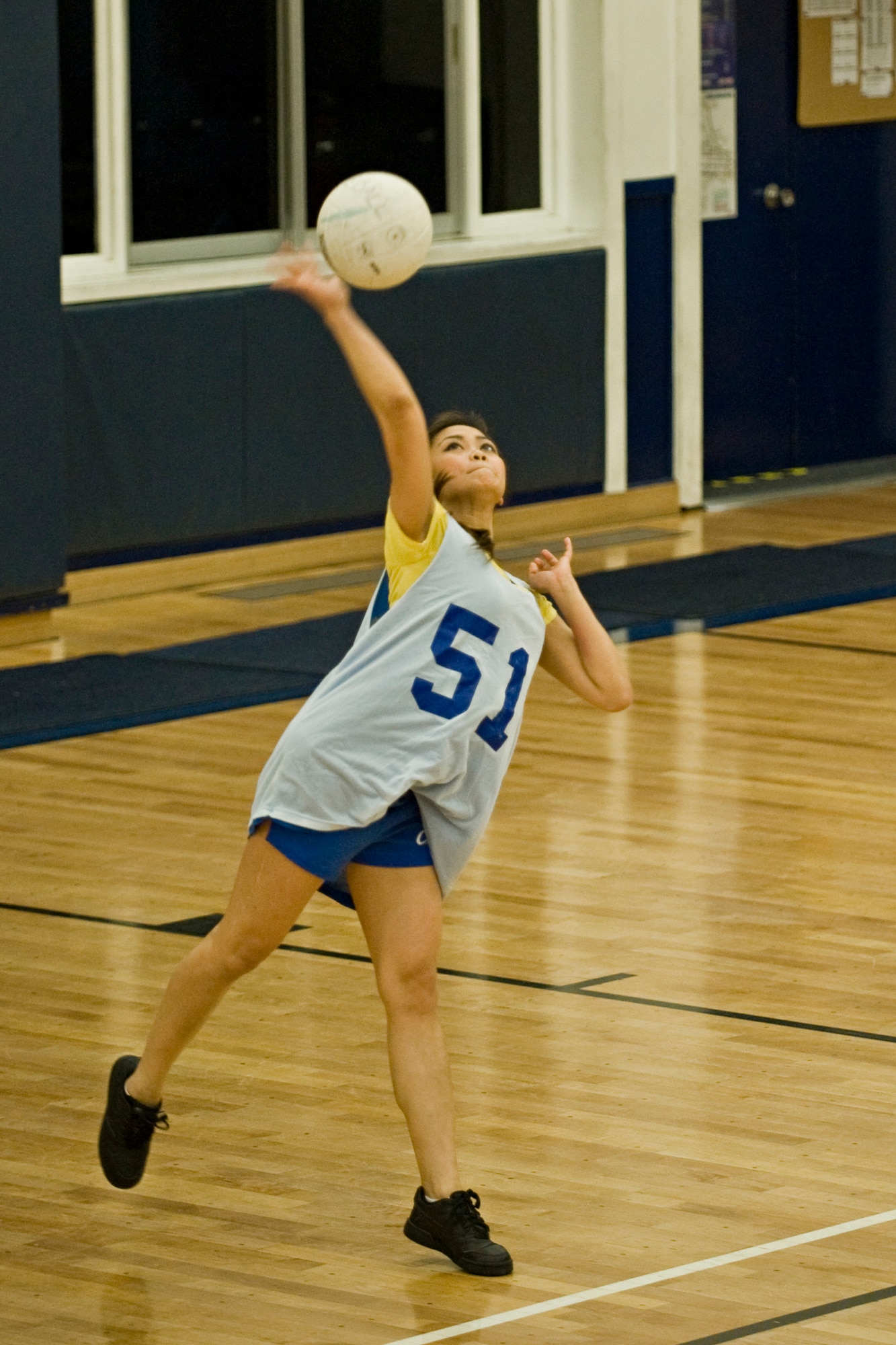 MISAWA AIR BASE, Japan -- Maria Goody, of the 35th Force Support Squadron, serves the ball during a volleyball game at the Potter Fitness Center March 29. Goody has played volleyball since high school; this is her first time playing with the 35th FSS. (U.S. Air Force photo/Senior Airman Jamal D. Sutter)