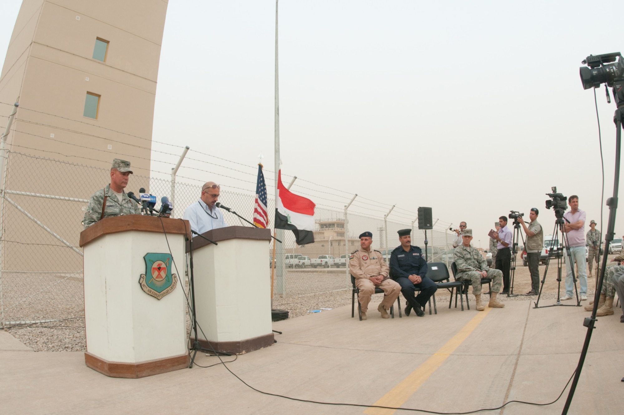 U.S. Air Force Col. Lou Danner, commander, 407th Air Expeditionary Group,
Ali Base, Iraq, delivers commemorating speech for the Airfield day held here
at Ali Base March 27, 2010. The distinguished visitors included Brig. Gen.
Sami (L), Iraq Air Force, Maj. Gen. Sabah Al-Fatwawi, commanding general,
Dhi Qar Province police chief and Col. Jeffry Knippel, commander, Gulf
Region South, U.S. Army Corps of Engineers. (U.S. Air Force photo by Senior
Master Sgt. Elizabeth Gilbert)
