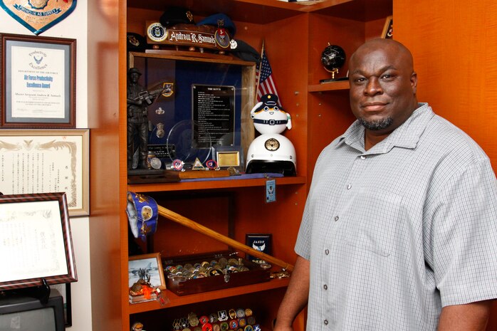 Andrew Samuels, a retired Air Force master sergeant and the current station anti-terrorism officer, displays in his office some of his past accomplishments throughout his career.::r::::n::He was recently awarded the 2009 Security and Law Enforcement Civilian Marine of the Year Award in Austin, Texas, at the annual Security and Law Enforcement conference.