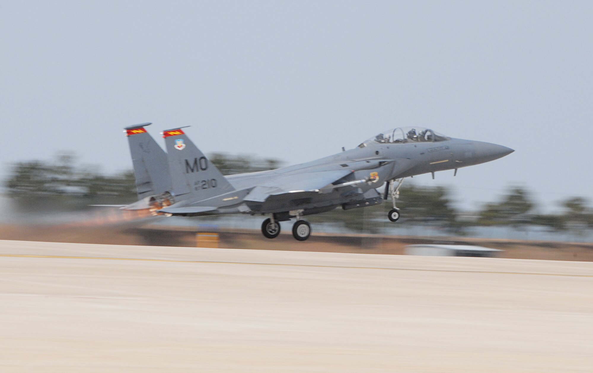 An F-15E Strike Eagle from the 391st Expeditionary Fighter Squadron takes off for some aerial maneuvers during an exercise March 16, 2010, at Kunsan Air Base, South Korea. The exercise places U.S. and South Korea air force pilots together for several realistic aerial exercises to familiarize with each other's tactics and procedures. (U.S. Air Force photo/Senior Airman Roy Lynch)
