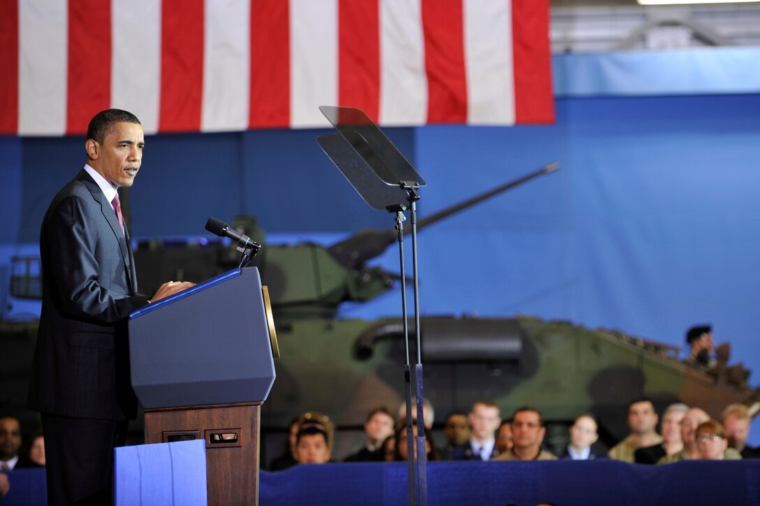 President Barack Obama speaks to military and civilian personnel about his plan to lift the nearly 20 year executive ban on oil and natural gas drilling off the Atlantic Ocean and Gulf of Mexico, March 31, at Joint Base Andrews, Md. President Obama also announced the Navy F/A-18F Super Hornet, dubbed "The Green Hornet," is slated to be tested on Earth Day, April 22. If the test is successful, it will be the first fighter to reach supersonic speed with a 50/50 blend of Hydrotreated Renewable Jet and JP-8 fuel. (U.S. Air Force photo by Airman 1st Class Perry Aston)