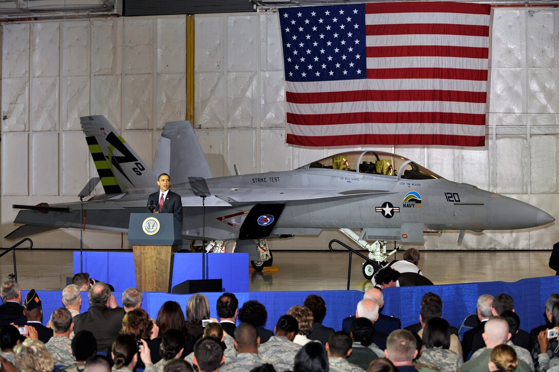 President Barack Obama speaks to military and civilian personnel about his plan to lift the nearly 20 year executive ban on oil and natural gas drilling off the Atlantic Ocean and Gulf of Mexico, March 31, at Joint Base Andrews, Md. President Obama also announced the Navy F/A-18F Super Hornet, dubbed "The Green Hornet," is slated to be tested on Earth Day, April 22. If the test is successful, it will be the first fighter to reach supersonic speed with a 50/50 blend of Hydrotreated Renewable Jet and JP-8 fuel. (U.S. Air Force photo by Airman 1st Class Perry Aston)
