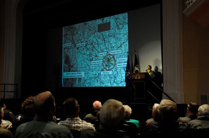 Former Viet Nam POW Laurie Lengyel, Lt. Col. (Ret), addresses a symposium at the Randolph Air Force Base theatre, on the escape attempt of prisoners from the "Zoo" prison in Hanoi, in North Viet Nam. (U.S. Air Force photo by Steve White)