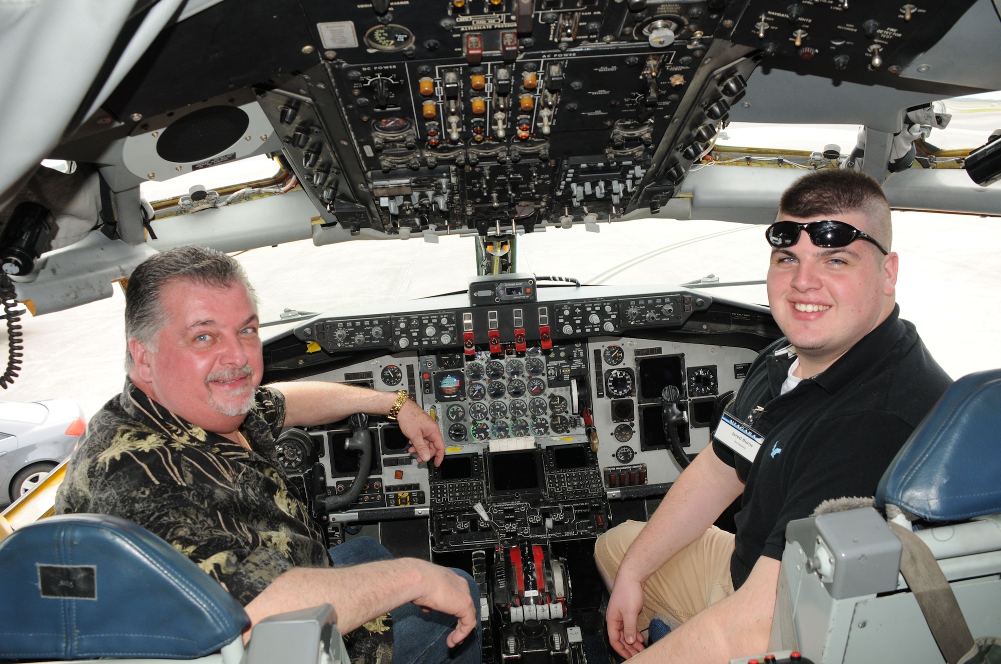 Local Tim Hortons owner Robert Burns (on left) and his son Jared Burns inspect the cockpit of a KC-135. The two employers along with more than 35 other local employers had the opportunity to tour the KC-135 on a recent ESGR funded trip to the 927th Air Refueling Wing at MacDill Air Force Base, Tampa, Fla.  "Man this plane is awesome," said Jared Burns, Vice President of Operations for five local Tim Hortons. "Did you see me in the cockpit ? That was so cool, I want to be a pilot," he added. (U.S. Air Force photo/Senior Master Sgt. Ray Lloyd)