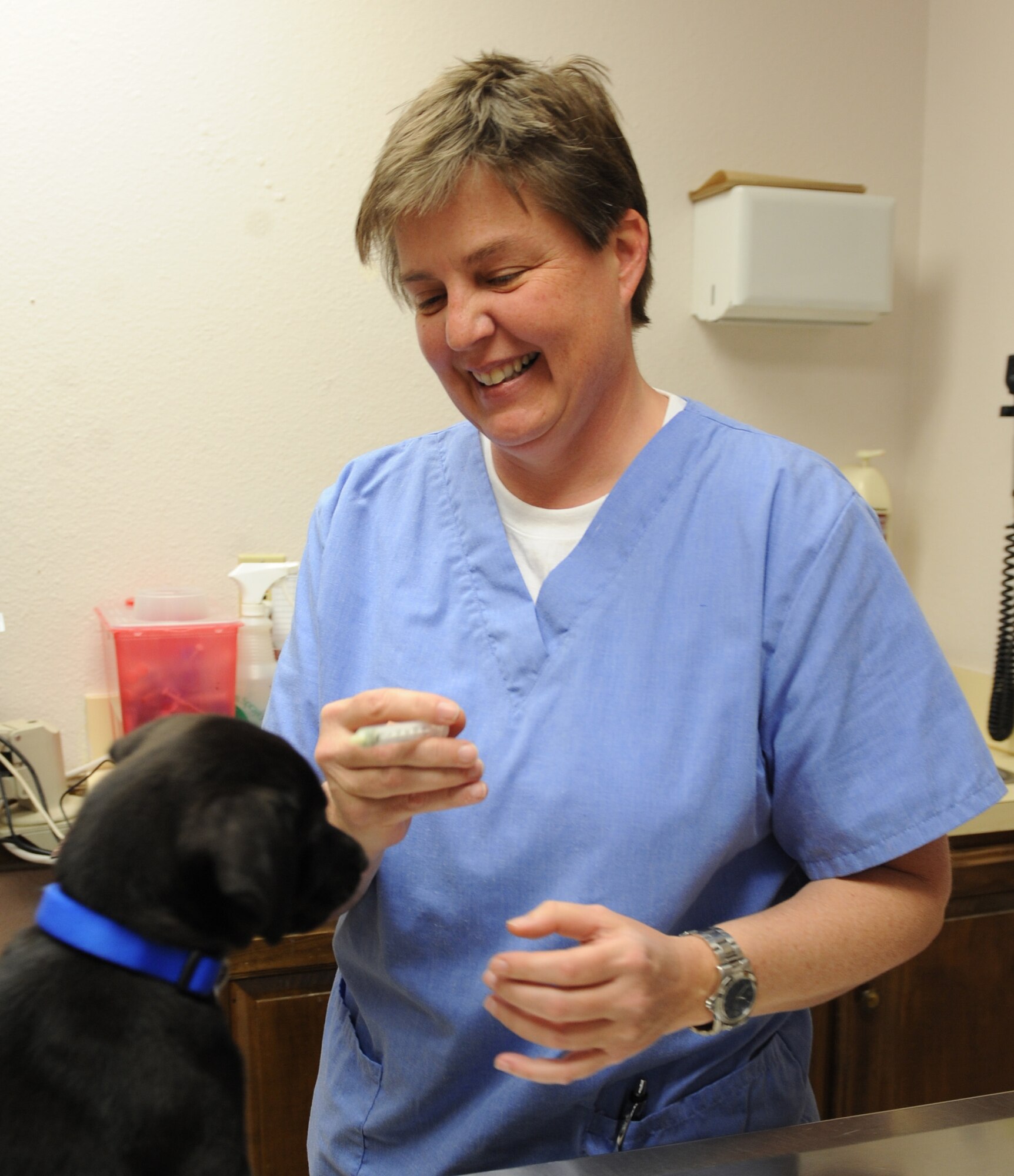 DYESS AIR FORCE BASE, Texas – Dr. Denise Ruark, Dyess Vet Clinic veterinarian, gives Harvey his first set of vaccinations here, March 29. The Dyess Vet Clinic is open Monday through Thursday from 9 a.m. to 4 p.m. and Fridays from 9 a.m. to 2 p.m. (U.S. Air Force photo/ Airman 1st Class Brittney Prescott)