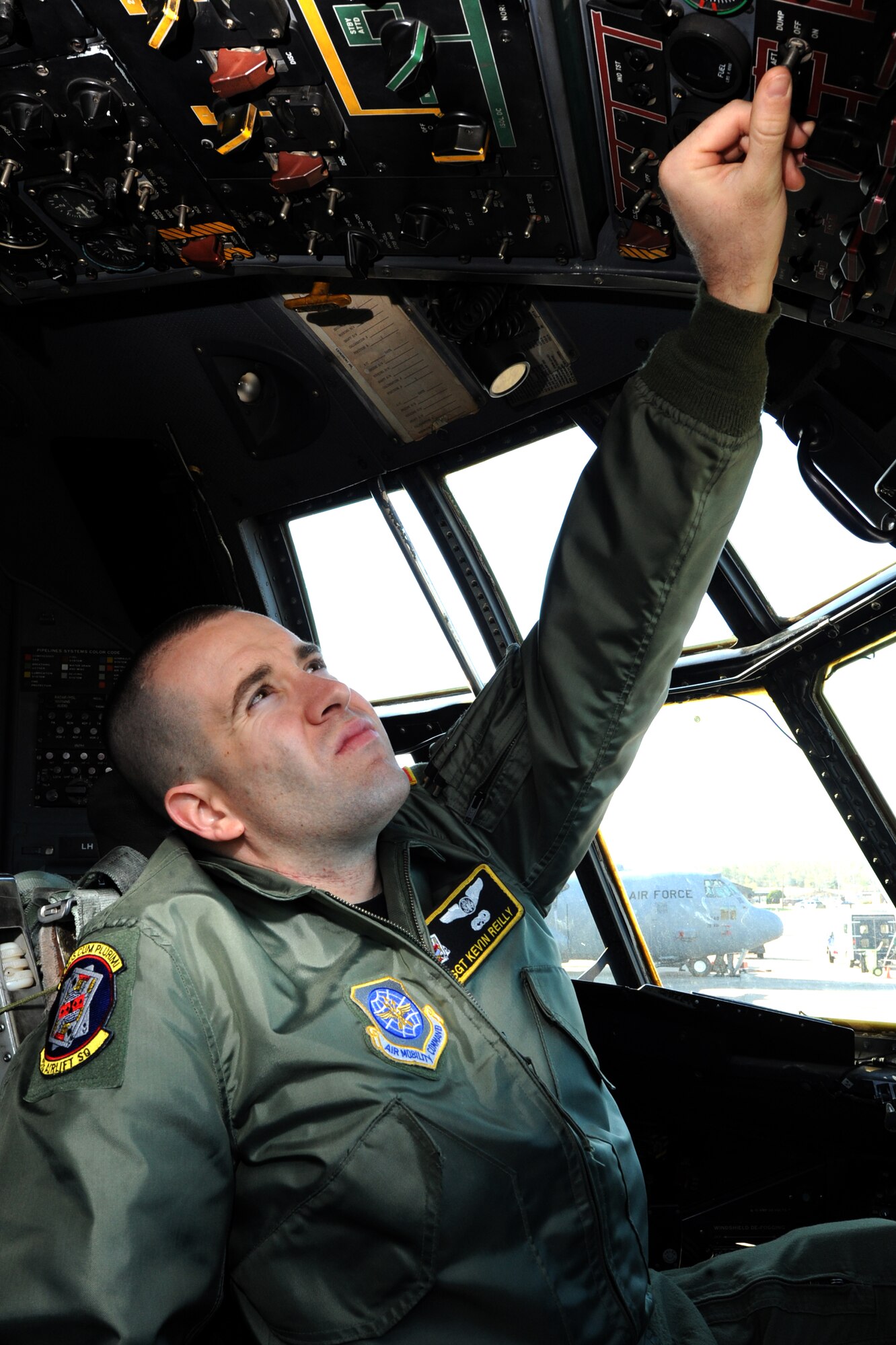 Staff Sgt. Kevin Reilly, 53rd Airlift Squadron flight engineer, checks the configurations of all the switches on a C-130 March 31 to make sure the plane will operate safely during a mission. Sergeant Reilly graduated from his C-130 Flight Engineer course with a 98 percent academic average and was rated ‘exceptionally qualified’ on his initial flight evaluation. (U.S. Air Force photo by Senior Airman Ethan Morgan)